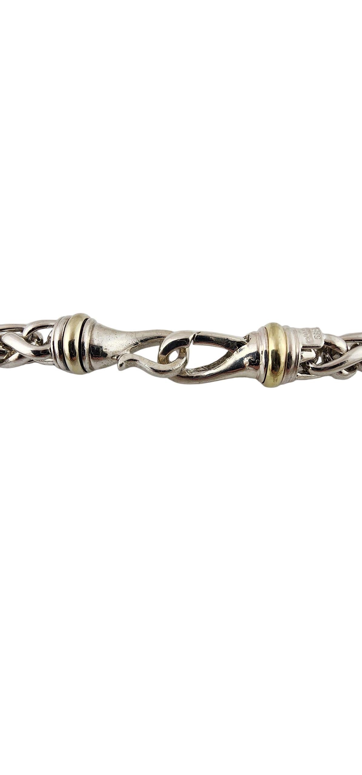 David Yurman Sterling Silver & 14K Yellow Gold Spiga Chain

This piece features a David Yurman chain meticulously detailed in sterling silver and 14 karat yellow gold. The intricately woven spiga design creates a strong yet flexible chain that