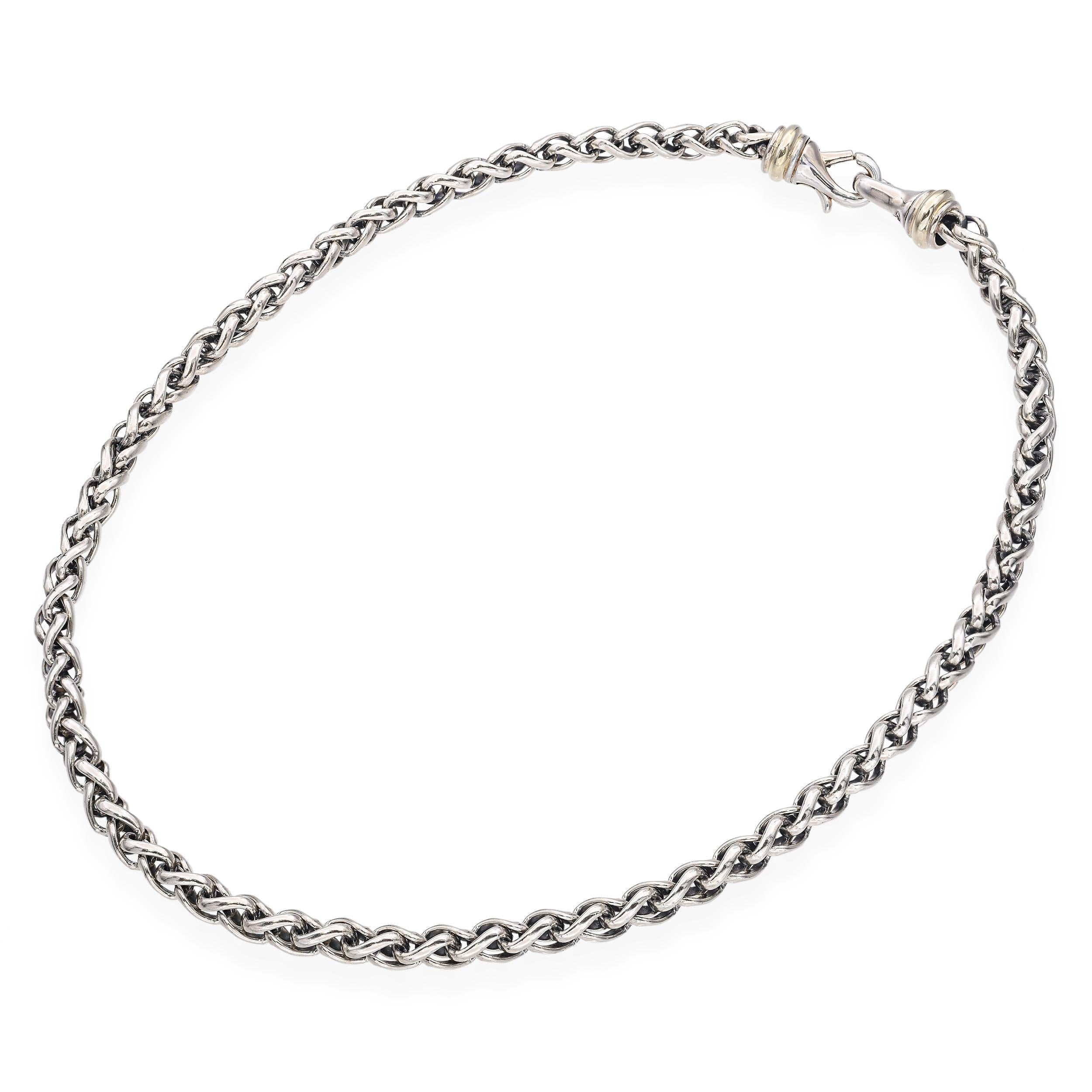 A timeless and iconic design from David Yurman, this spiga link chain is crafted in sterling silver with elegant 14k yellow gold accents. The woven spiga link pattern offers both flexibility and durability while maintaining a bold yet sophisticated