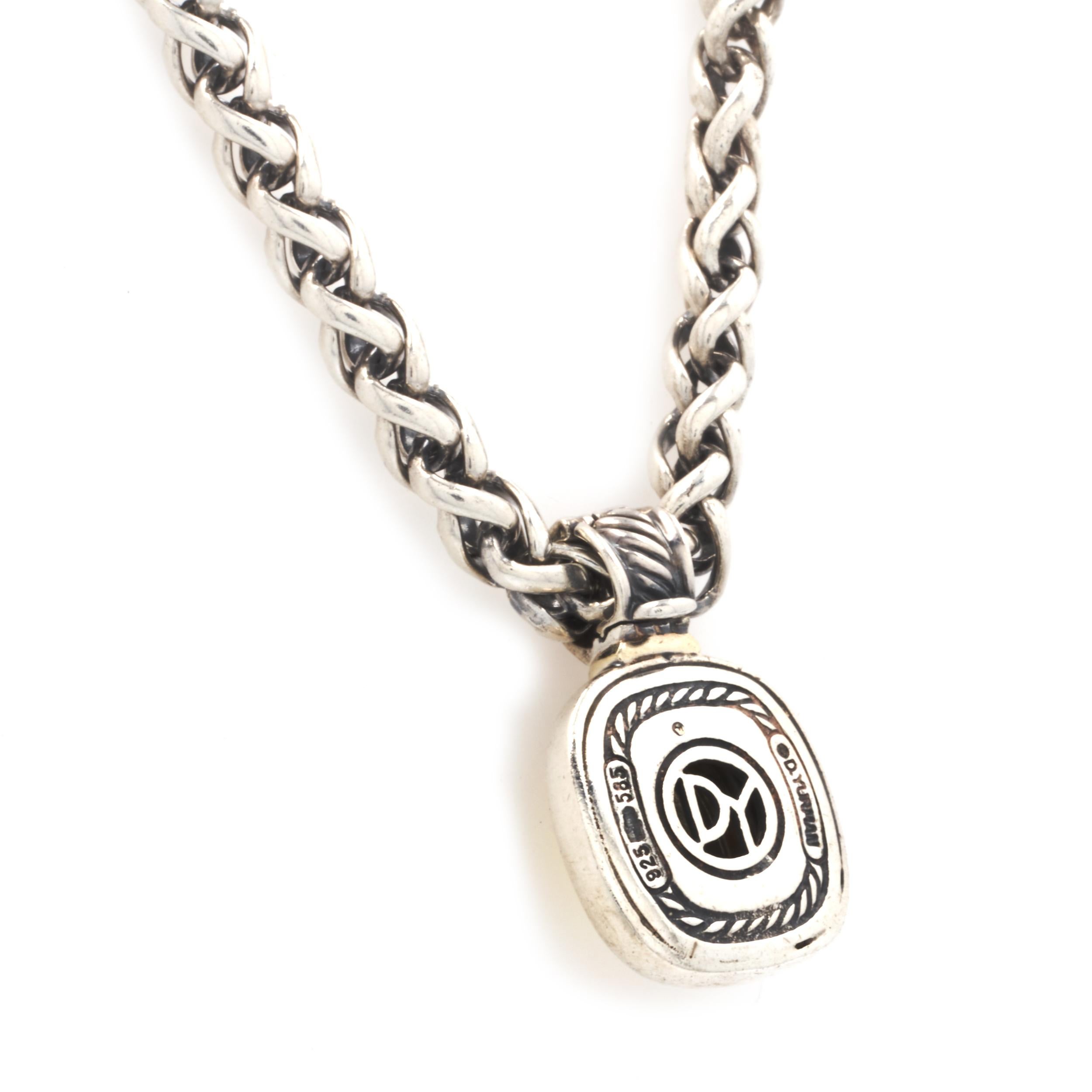 Designer: David Yurman
Material: sterling silver & 14K yellow gold
Weight: 63.57 grams
Measurement: necklace measures 18-inches in length
