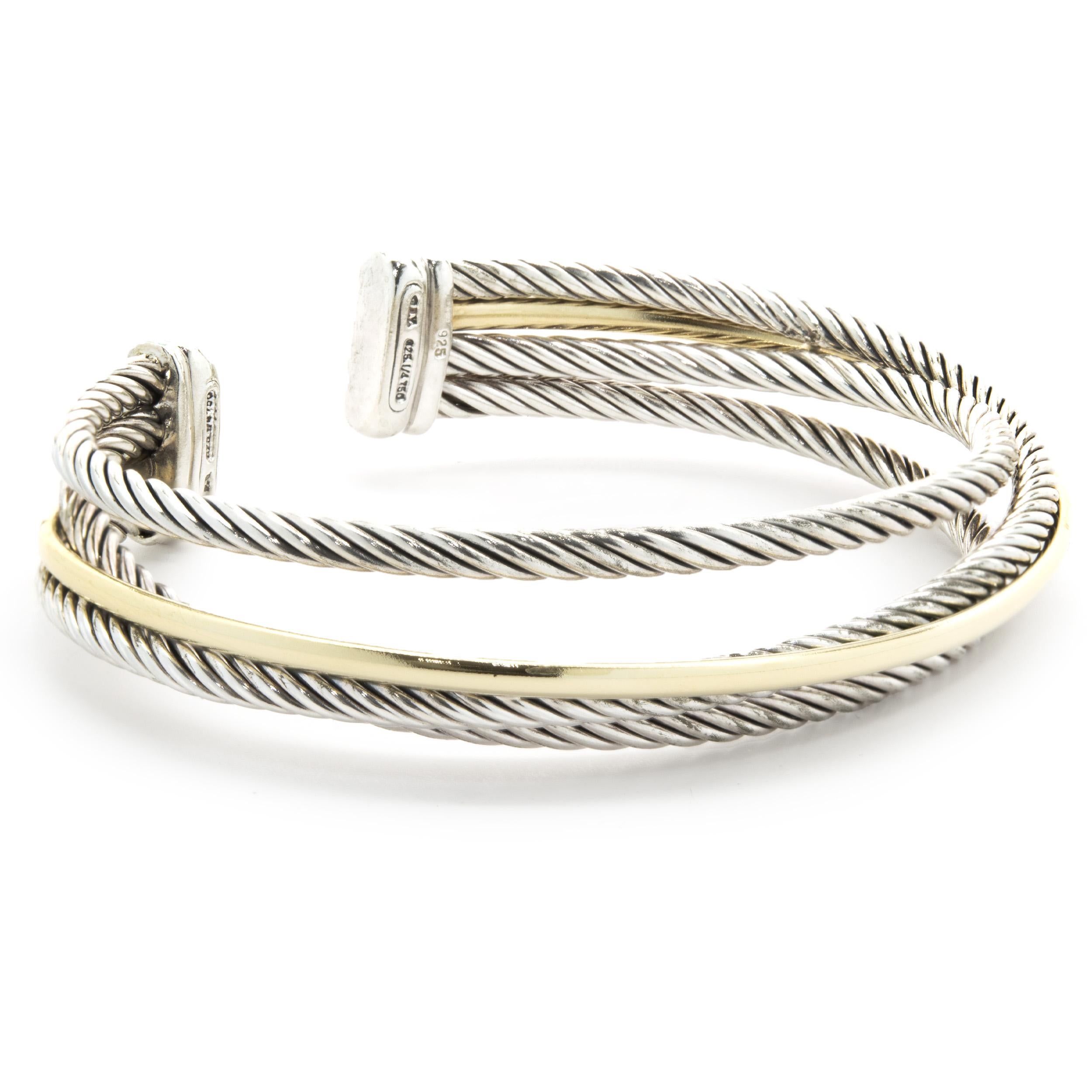 Designer: David Yurman
Material: sterling silver / 18K yellow gold
Dimensions: bracelet measures 11.5mm wide, fits up to a 6.5-inch wrist

No box or papers included
Guaranteed authentic by seller
