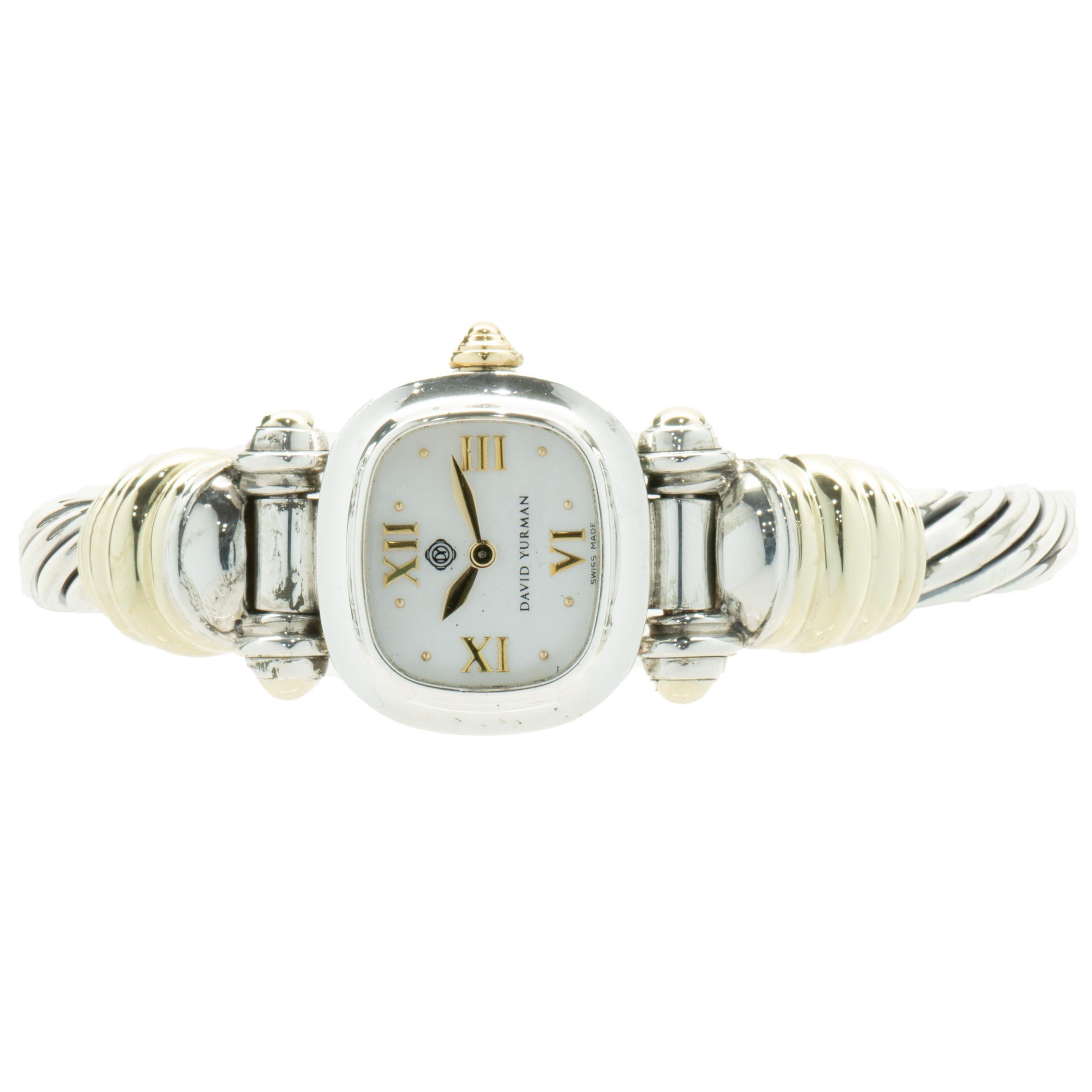 Designer: David Yurman
Material: sterling silver / 14K yellow gold bezel
Dial: Mother of Pearl
Serial # T-20XXX
Dimensions: watch top measures 21 x 19mm

No box or papers included