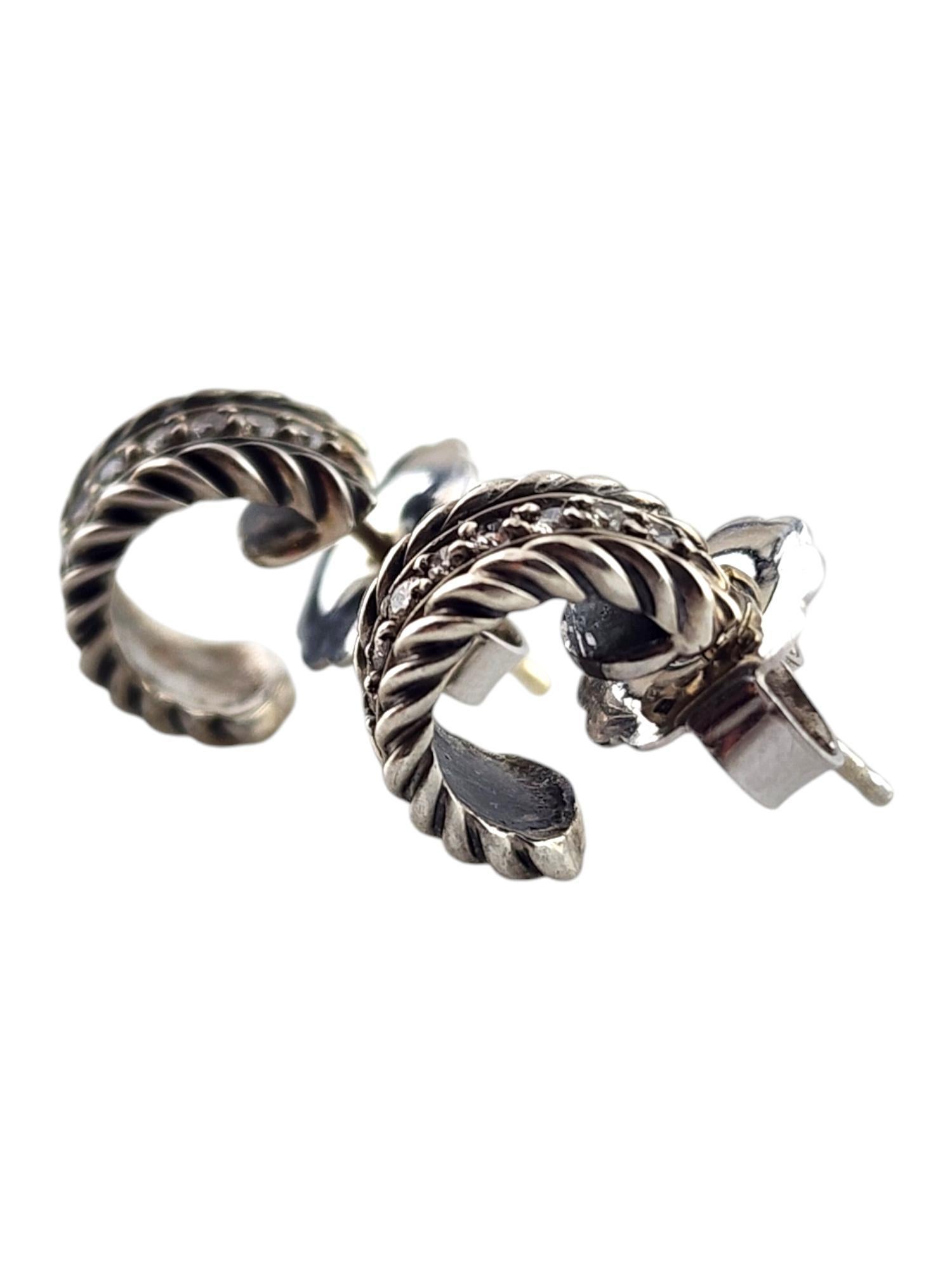 David Yurman Sterling Silver 18K White Gold Diamond Mini Hoop Earrings

This gorgeous set of small hoop earrings by David Yurman were crafted from sterling silver and features 16 sparkling diamonds! Posts are 18K white gold. 

Size: 11.6mm X 5.9mm X