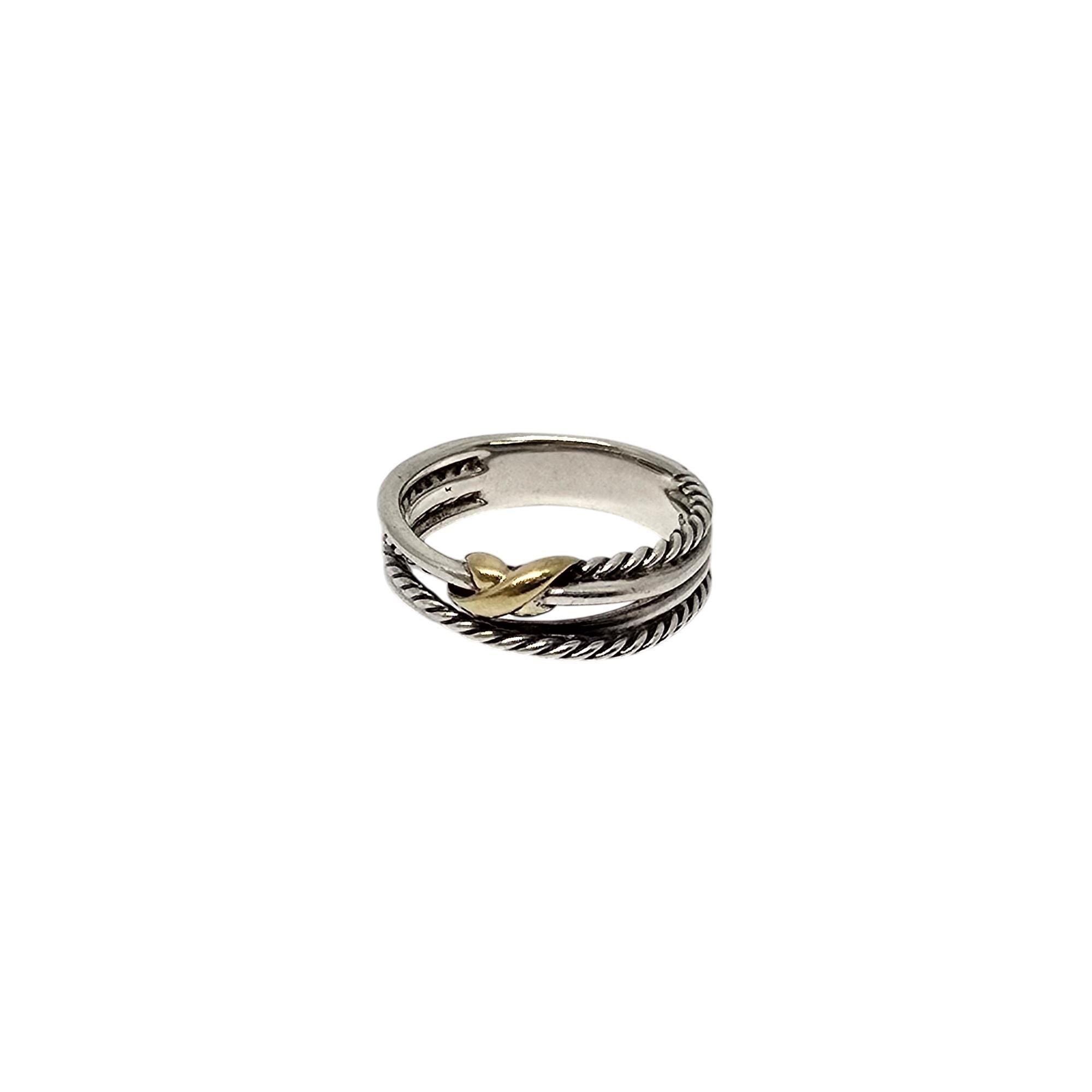 Sterling silver with 18K yellow gold accent X crossover ring by David Yurman.

Size 8 1/2

This classic Yurman ring features alternating smooth and twist design bands that crossover with a gold accent X at its center.

Measures approx 6mm