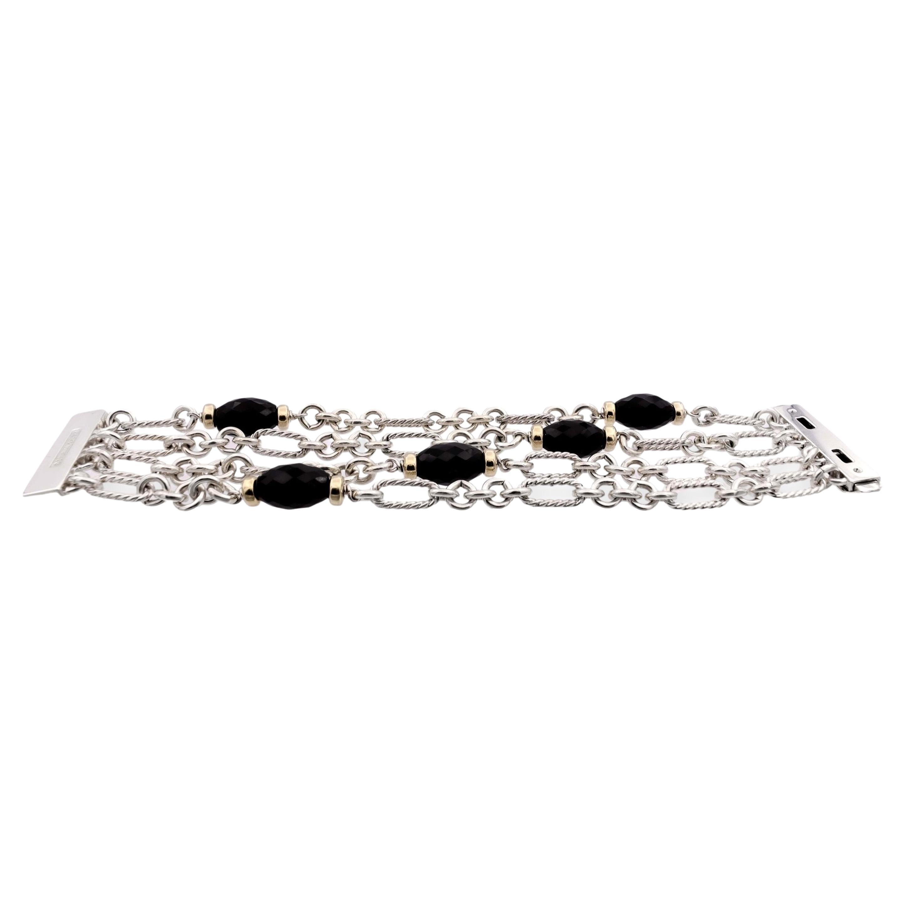 David Yurman Dujour wide bracelet from the Bijoux collection finely crafted in sterling silver and 18 karat yellow gold featuring four rows of articulated oval links , with rope accents, five faceted onyx beads, and ten 18 karat yellow gold