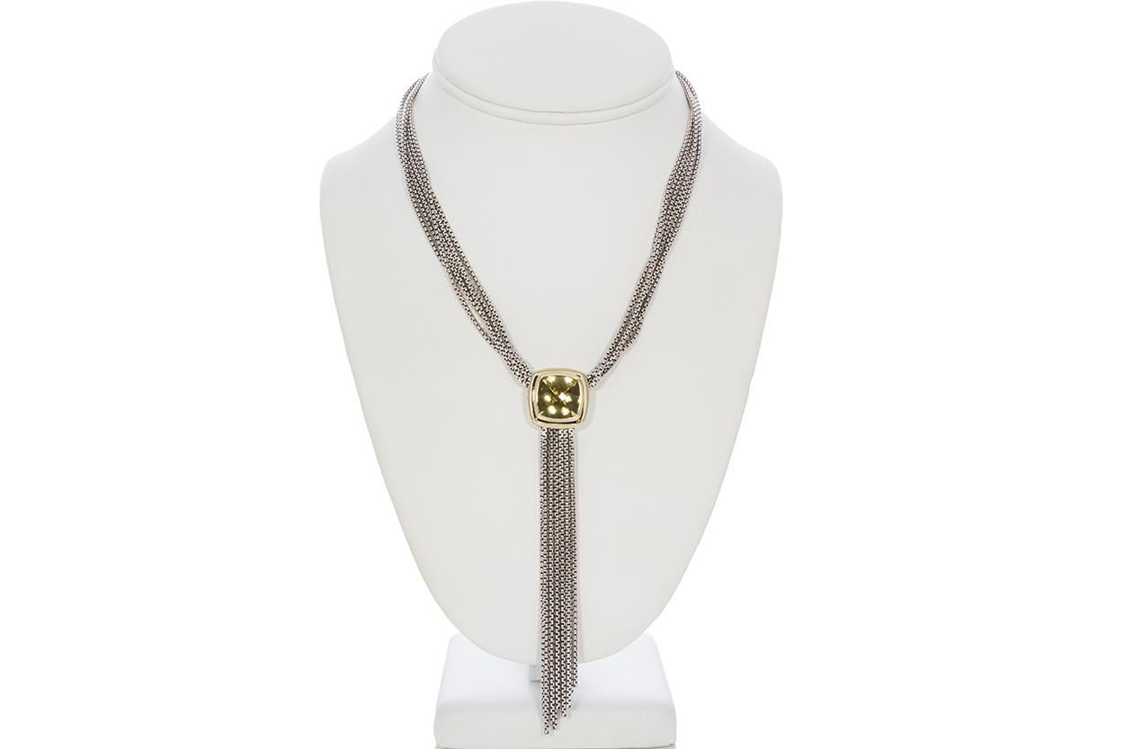 We are pleased to offer this David Yurman Sterling Silver & 18k Yellow Gold Citrine Albion Tassel Necklace. The Albion line was introduced in 1994. David Yurman wanted to design a line with a dramatic center stone and low profile that would sit