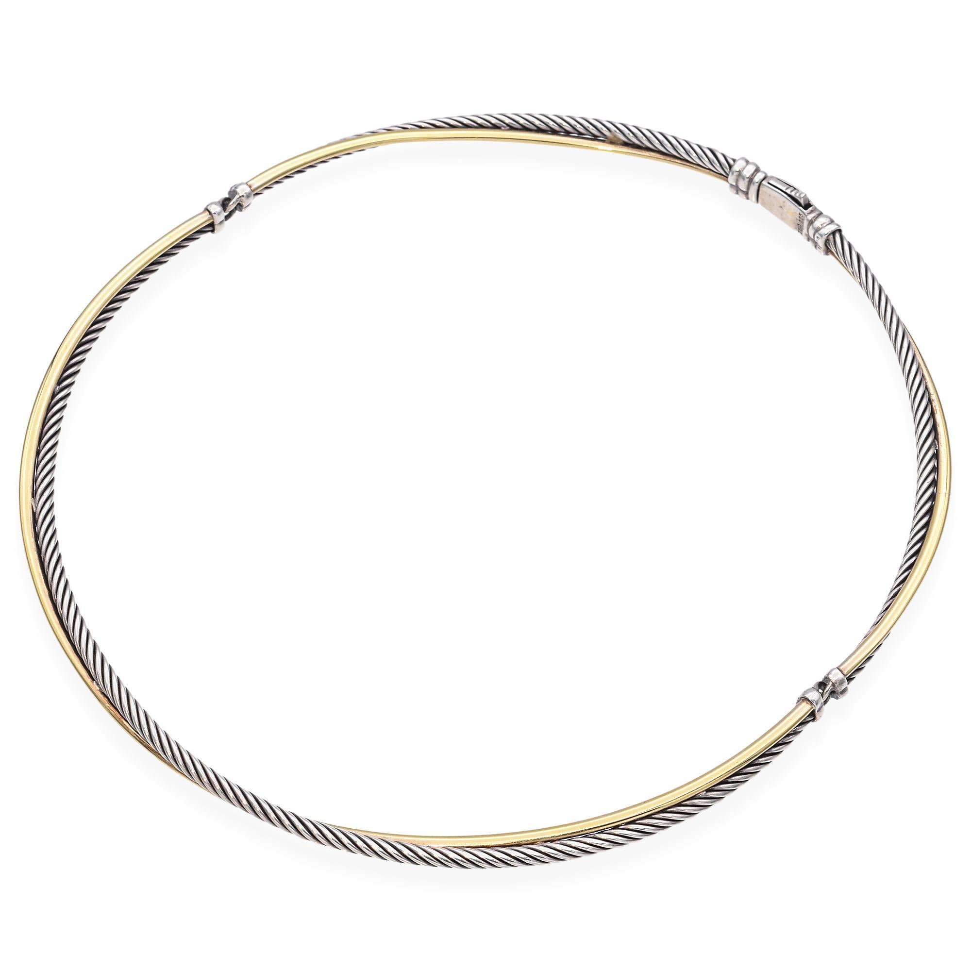 Elevate your style with this exquisite Sterling Silver & 18K Yellow Gold Crossover Cable Choker Necklace. Measuring 16 inches in length, this sophisticated piece features a striking twisted cable design that seamlessly blends the elegance of