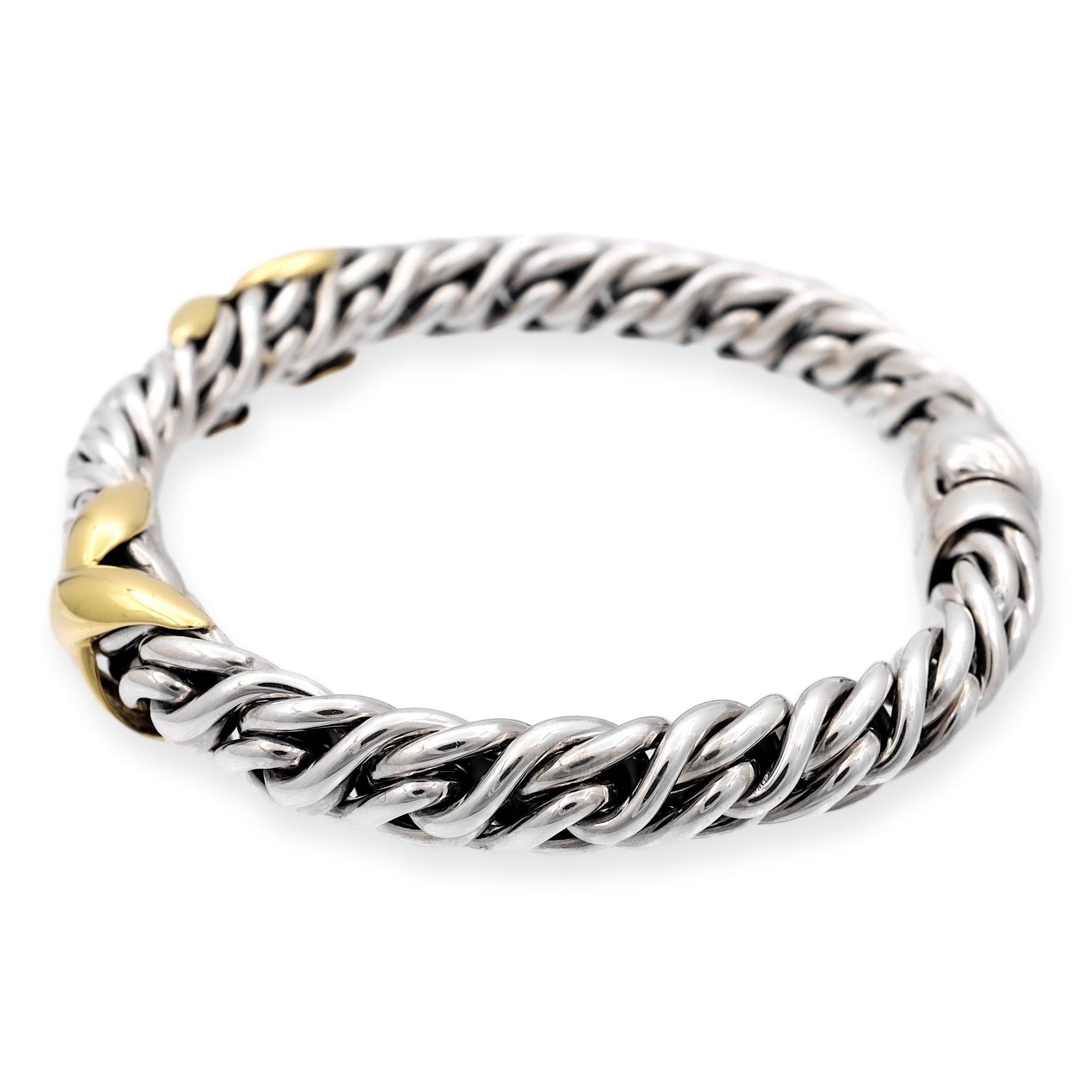 Adorn your wrist with the exquisite beauty of the David Yurman Lyrica Collection bracelet. Finely crafted in sterling silver, this bracelet showcases two elegant X motif stations in 18K yellow gold, seamlessly integrated into a classic wheat chain