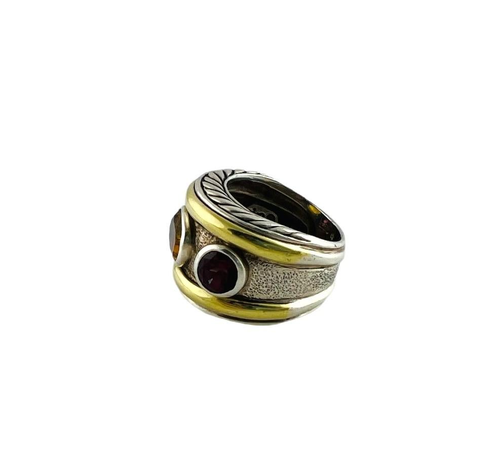 David Yurman Sterling Silver 18K Yellow Gold Renaissance Ring

This David Yurman band is from the Renaissance collection

It is set in sterling silver and 18K yellow gold

Center stone is an oval orange citrine. Two side stones are round pink