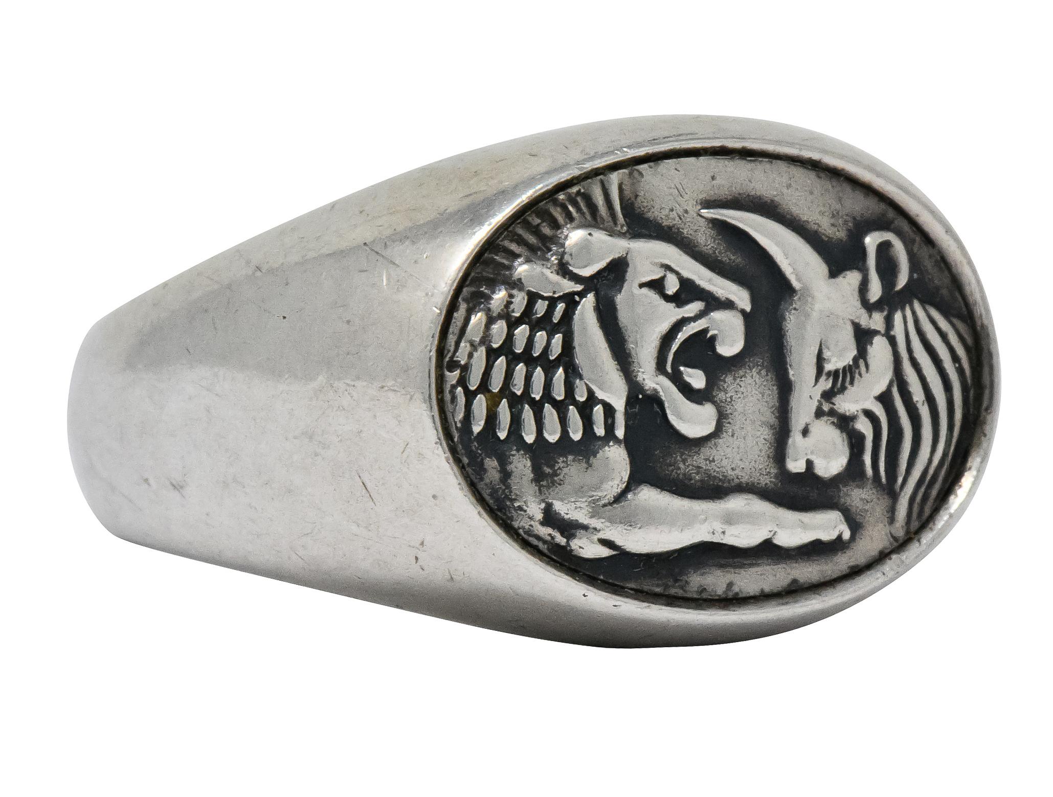 Oval, high relief depiction of lion roaring at passive ox

From David Yurman's Petrvs collection

With 22 karat gold David Yurman maker's mark

Stamped 925, 22k, and DY for David Yurman

Ring Size: 10 & Not Sizable

Measures: 16.1 x 22.7 mm and sits