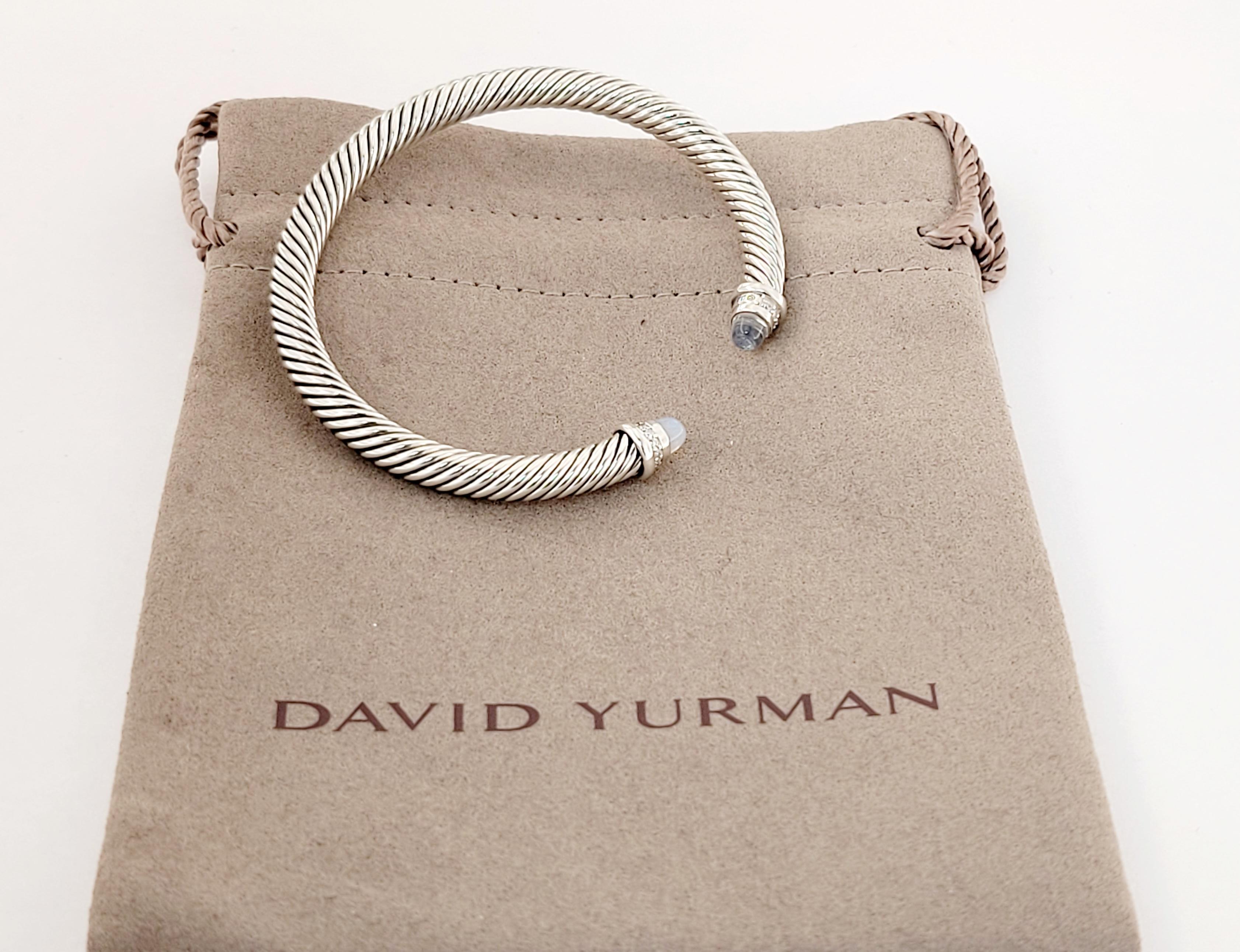 Brand David Yurman
Brand new, never worn
Gender women
Size small 
Material  sterling silver
Moonstone and Diamonds.
Bracelet width 5mm
Weight 25.3gr
Comes with David Yurman  pouch