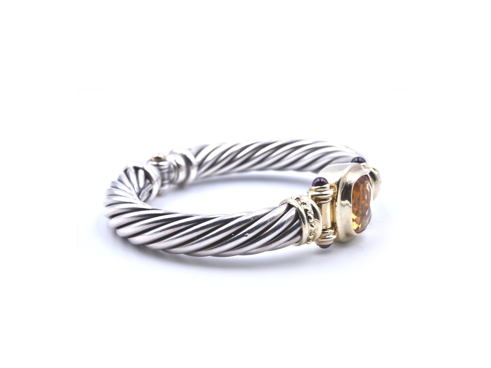 Designer: David Yurman
Material: sterling silver & 14k yellow gold
Dimensions: bracelet is 9.53mm wide and will fit a 6 ½ inch wrist
Weight: 52.31 grams
