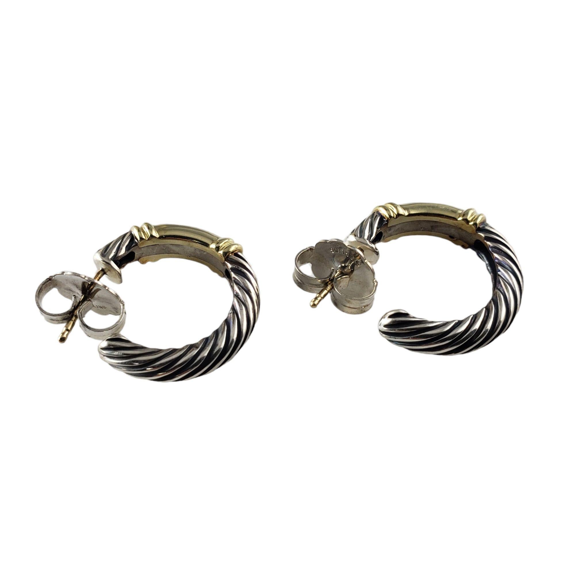 David Yurman Sterling Silver and 14 Karat Yellow Gold Metro Hoop Earrings-

These elegant hoop earrings by David Yurman are crafted in beautifully detailed sterling silver and 14K yellow gold. Width: 4 mm.

*Backs are not David Yurman.

Size: 22
