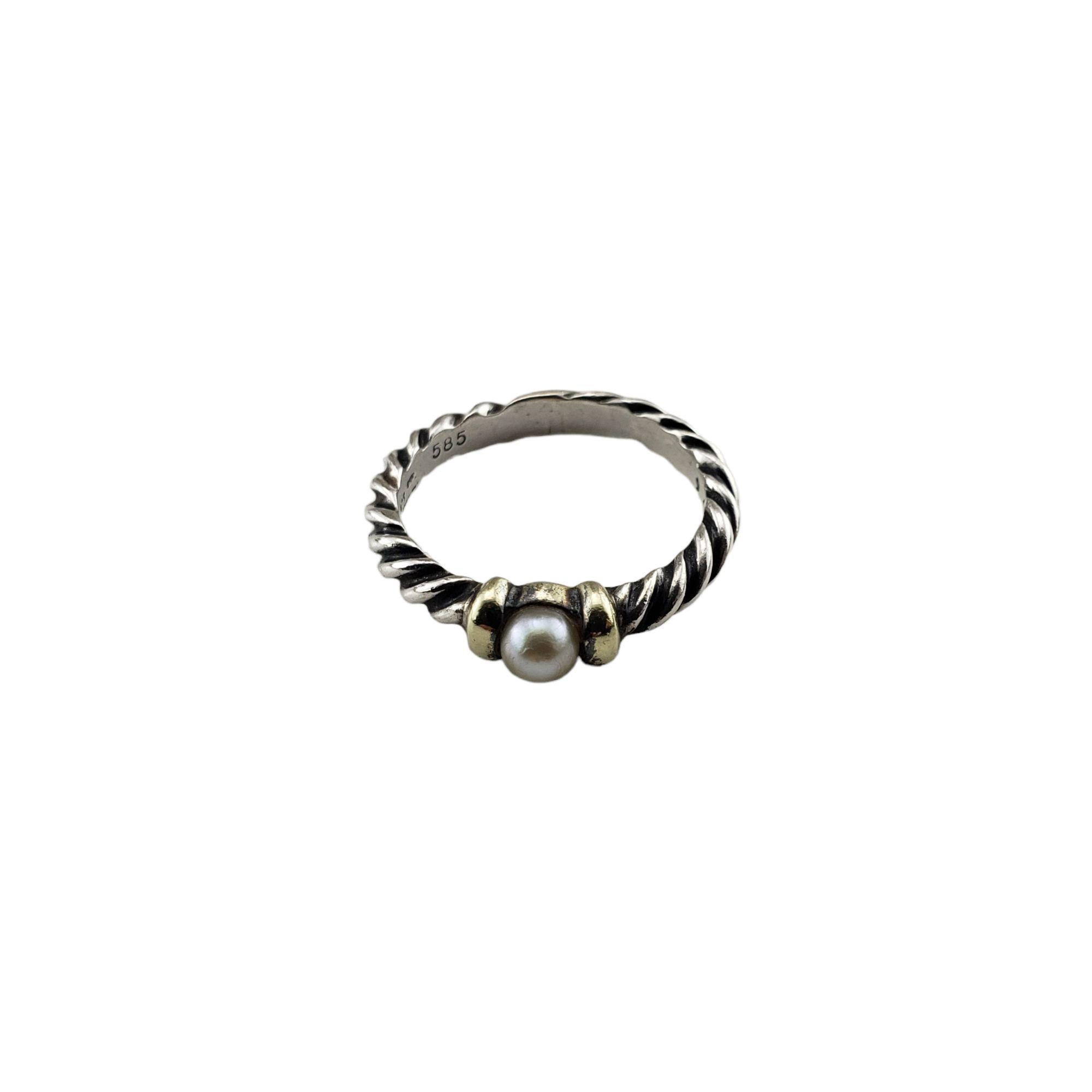 David Yurman Sterling Silver and 14 Karat Yellow Gold Pearl Ring Ring Size: 5-

This elegant ring by David Yurman features one round pearl ( 4 mm) set in sterling silver and 14K yellow gold. Shank: 3 mm.

Weight: 1.6 dwt. / 2.5