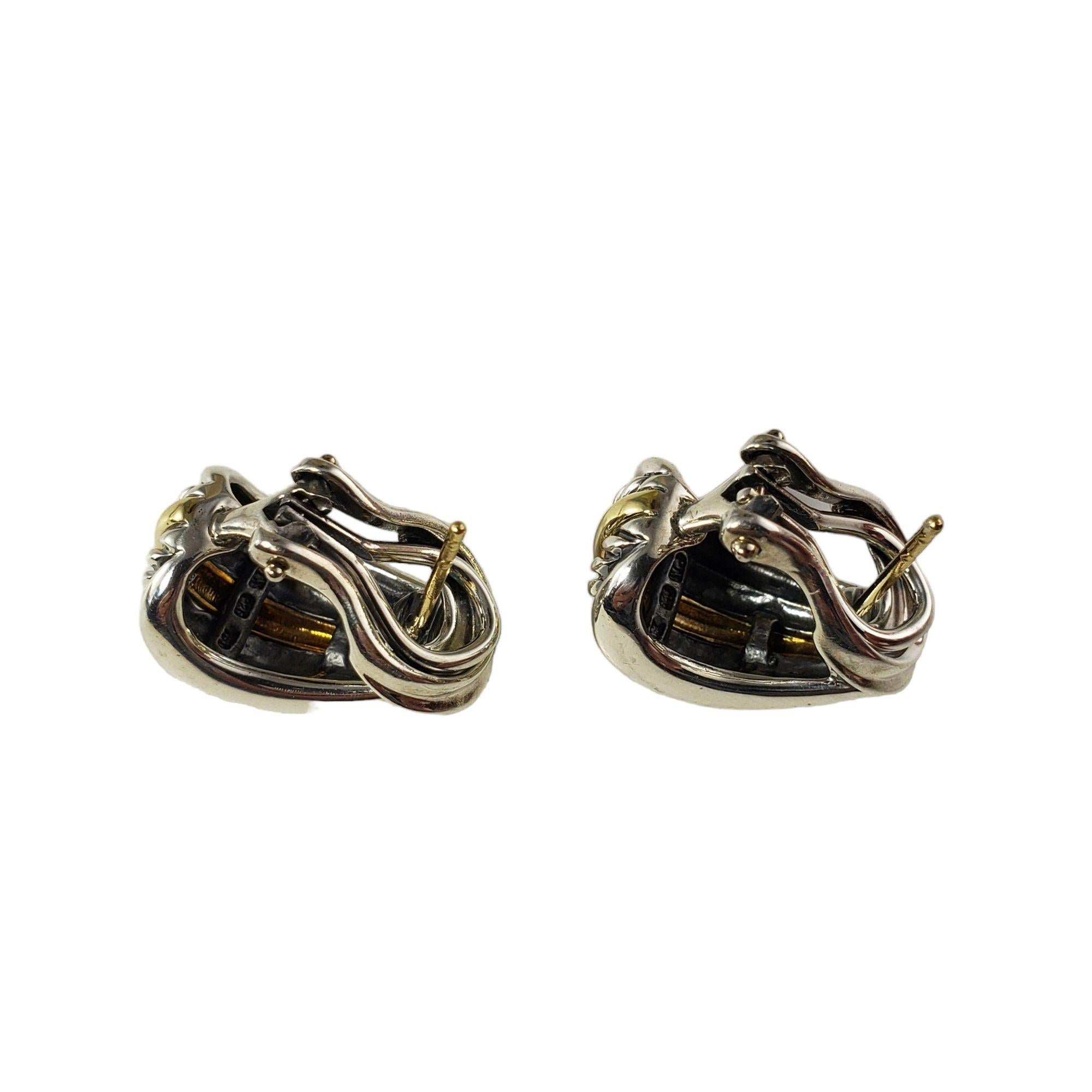 Vintage David Yurman Sterling Silver and 18 Karat Yellow Gold Cable Earrings-

These elegant earrings are crafted in meticulously detailed sterling silver and 18K yellow gold. Omega back closures.

Size: 20 mm x 12 mm

Weight: 12.3 gr./ 7.9