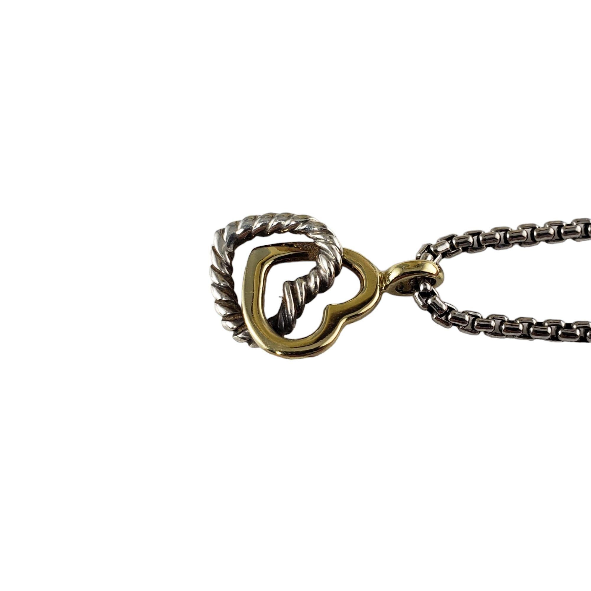 Vintage David Yurman Sterling Silber und 18 Karat Gelbgold Double Heart Halskette-

Diese romantische Doppelherz-Halskette von David Yurman ist aus wunderschönem Sterlingsilber und 18 Karat Gelbgold gefertigt.

Größe: 16.5 Zoll (Halskette)
13 mm x