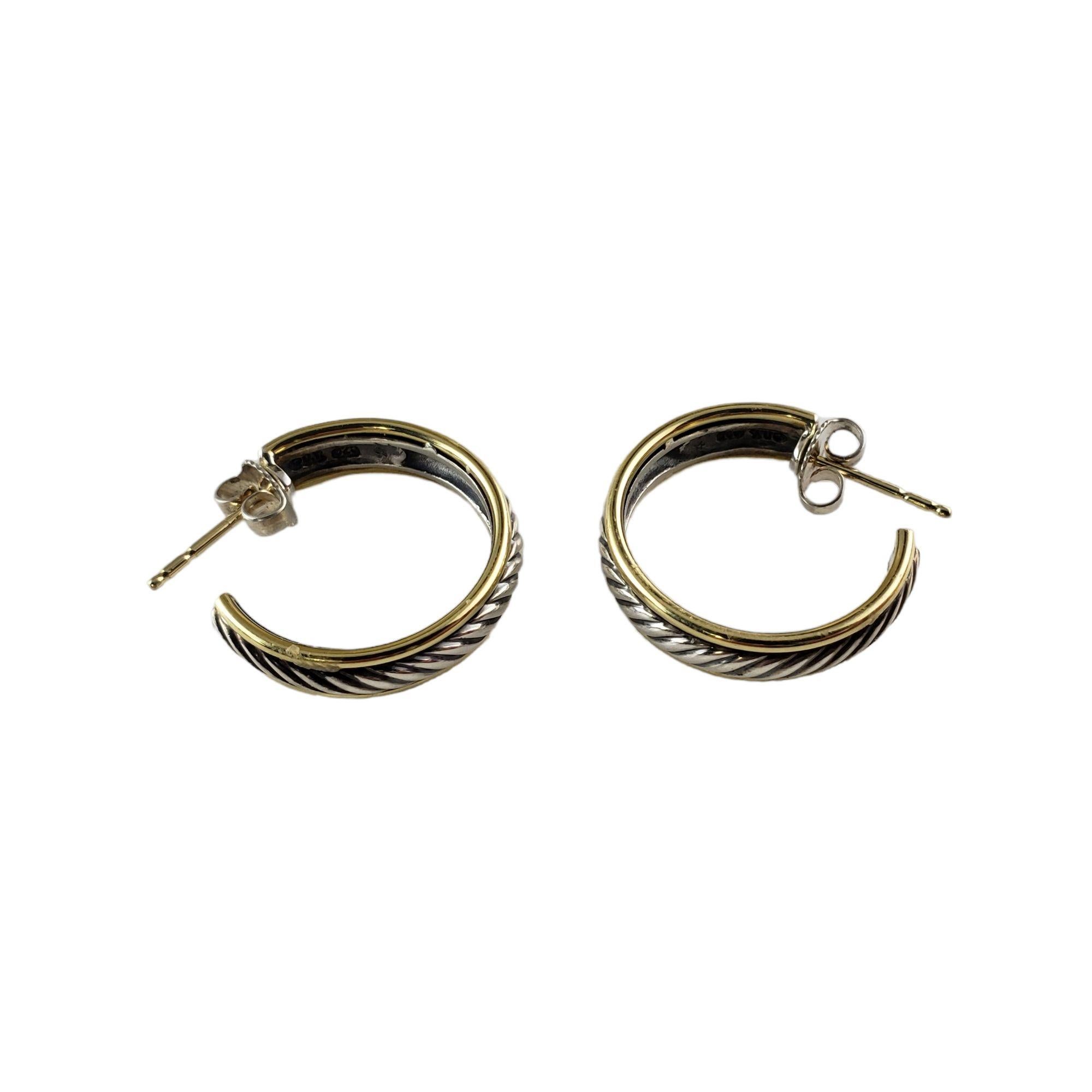 Vintage David Yurman Sterling Silver and 18 Karat Yellow Gold Cable Hoop Earrings-

These lovely David Yurman hoop earrings are crafted in beautifully detailed sterling silver and 18K yellow gold. Width: 5 mm.

Size: 22 mm

Weight: 7.3 gr./ 4.6