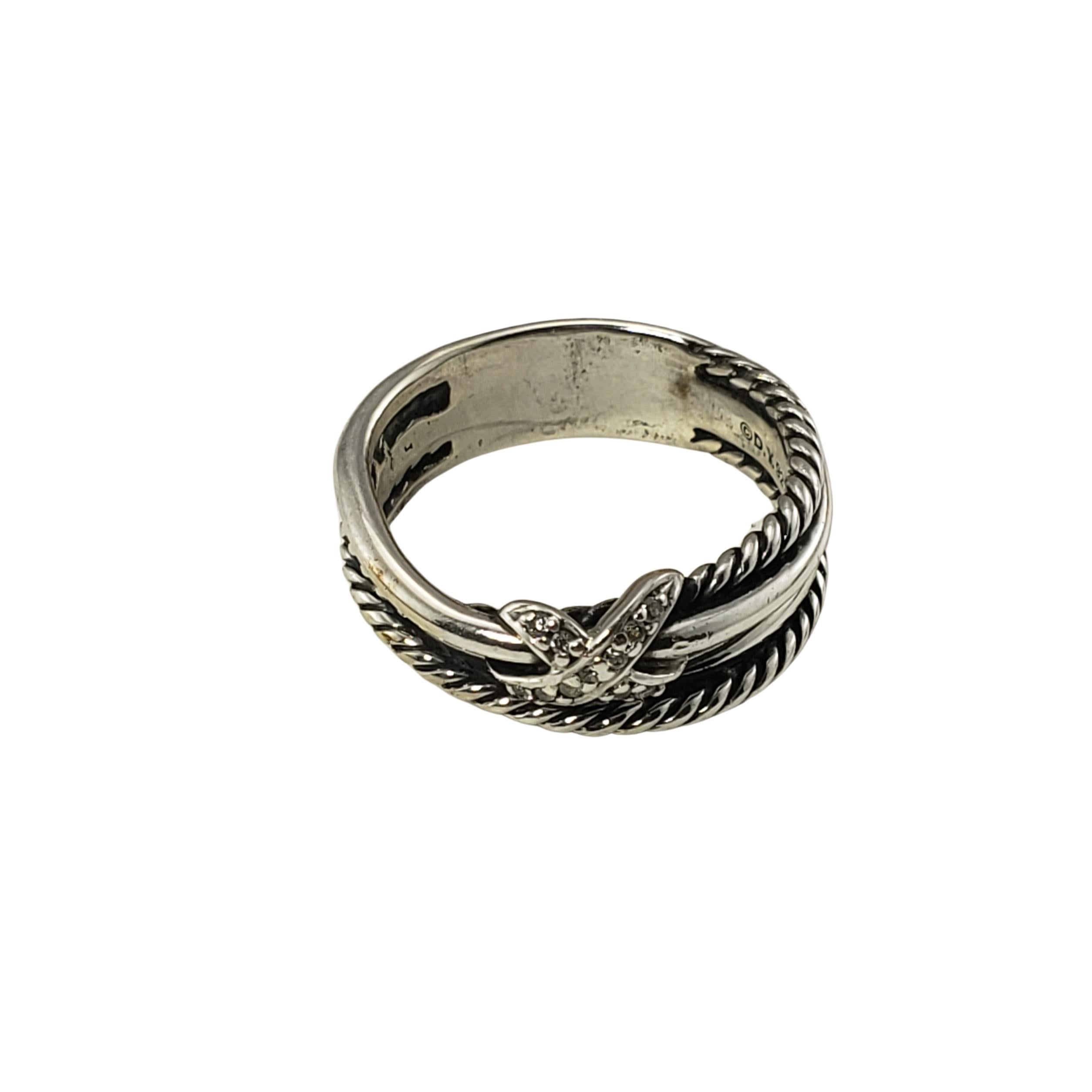 David Yurman Sterling Silver and Diamond Crossover Ring Size 6.75-

This lovely ring by David Yurman features 11 round brilliant cut diamonds set in beautifully detailed sterling silver.  Width: 6.5 mm.

Approximate total diamond weight:  .06