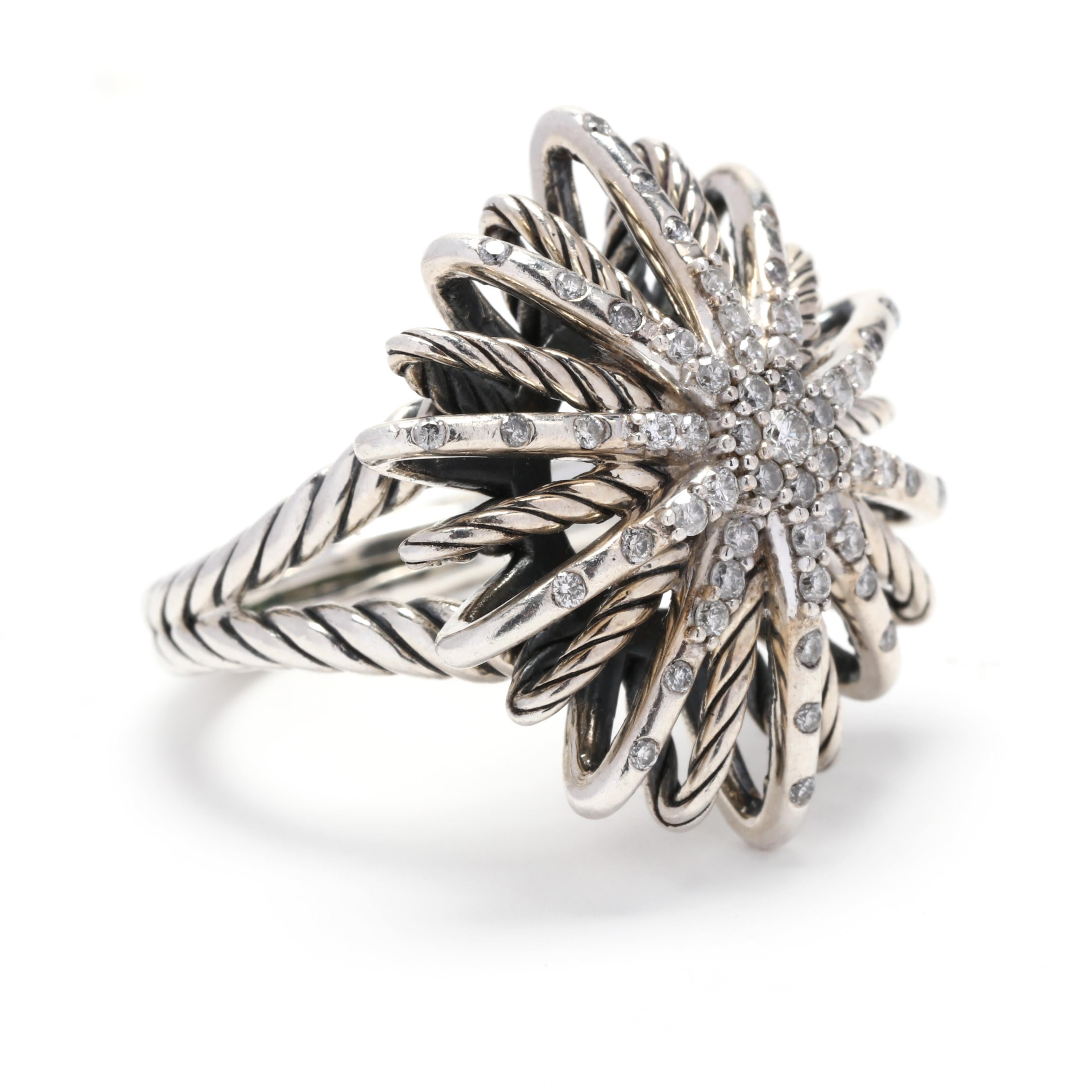 A David Yurman sterling silver and diamond starburst ring. This ring features a starburst design with polished and cable motif detailing, set with full cut round diamonds weighing approximately .50 total carats and a split shank.

Stones:
-