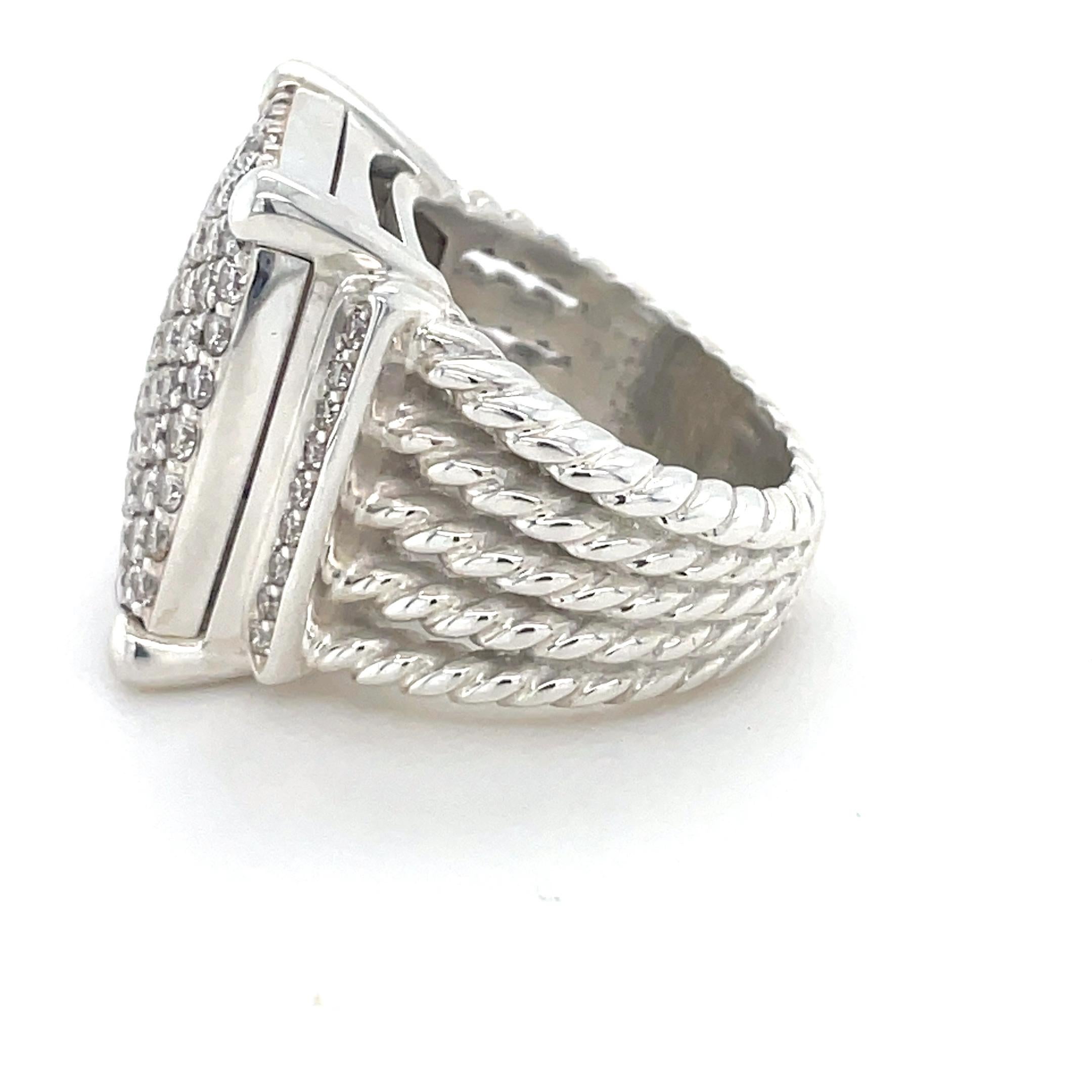 This classic ring designed by David Yurman from their Wheaton Collection, containing round brilliant cut diamonds weighing approximately 1.12 carats total.

Ring Size: 6
Stamp: D.Y. 925
Metal: Sterling Silver
Gross weight: 16.40 grams
Accompanied by