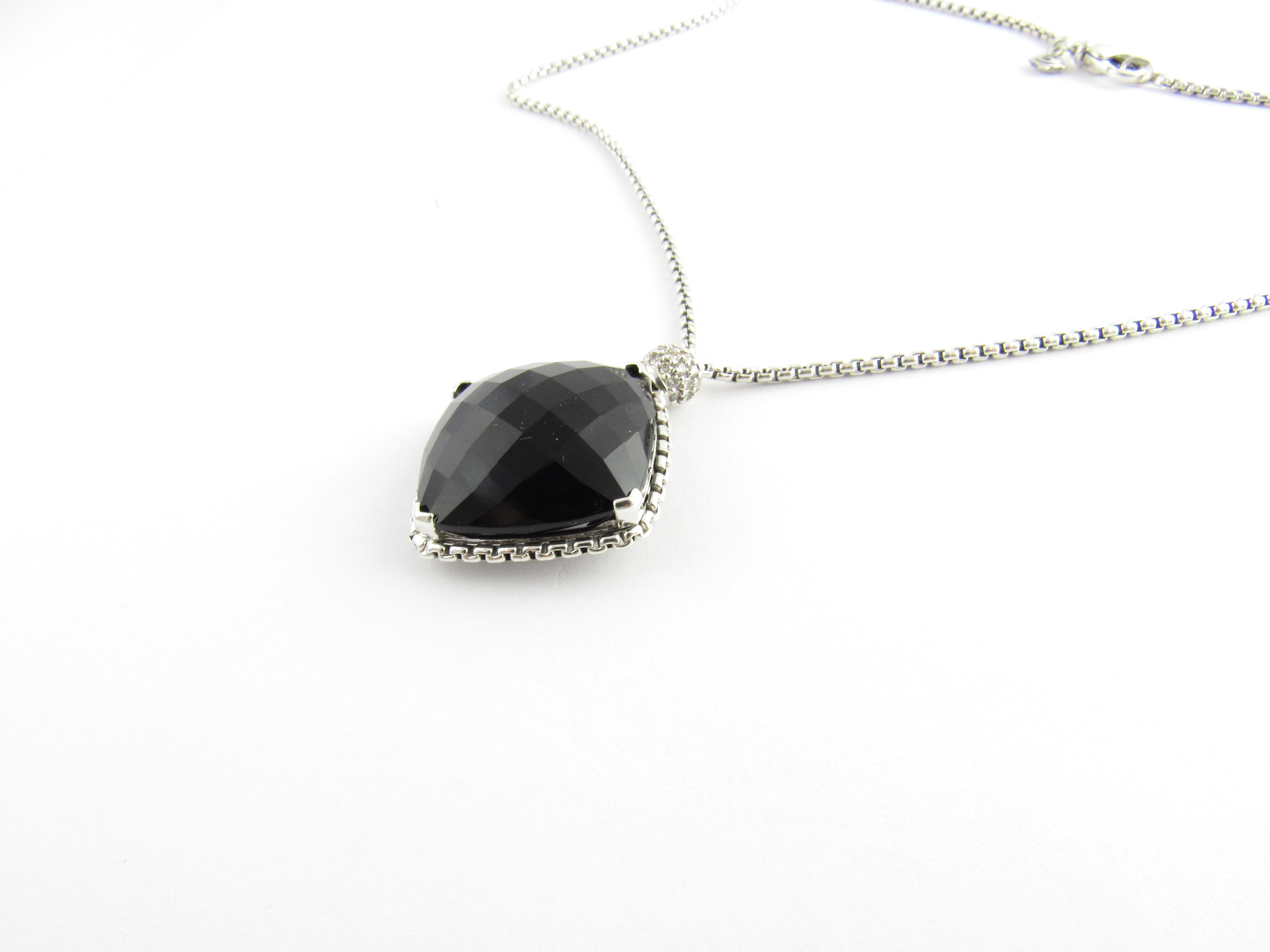 David Yurman Sterling Silver Black Onyx Diamond Cushion on Point Necklace

This authentic David Yurman necklace features a faceted cushion cut black onyx stone approx. 20mm x 20mm

Twisted cable setting

Pendant is on a DY baby box chain, 17