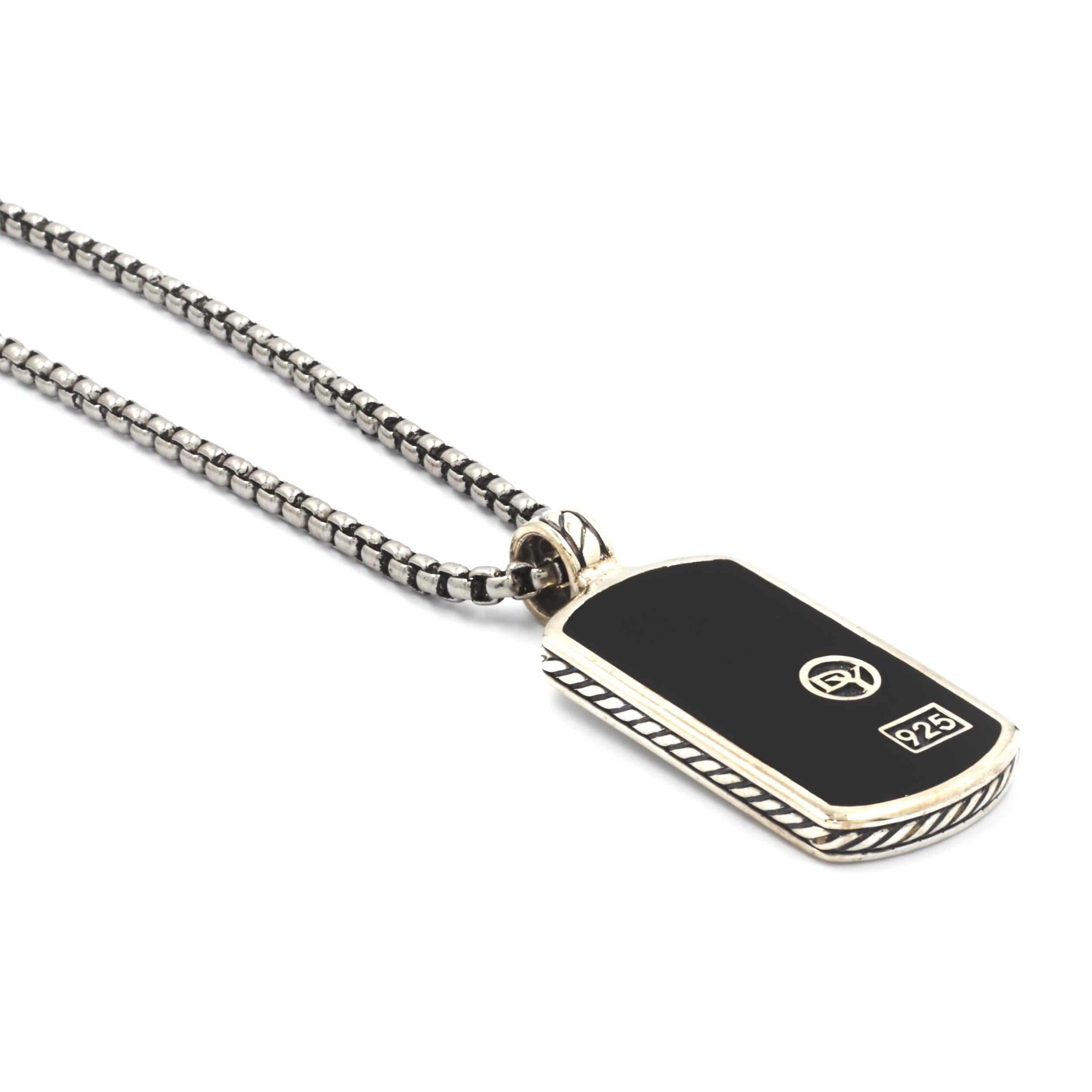 Designer: David Yurman
Material: sterling silver 
Weight: 16.01 grams
Measurement: pendant measures 44 X 19.5MM, chain measures 24-inches in length

