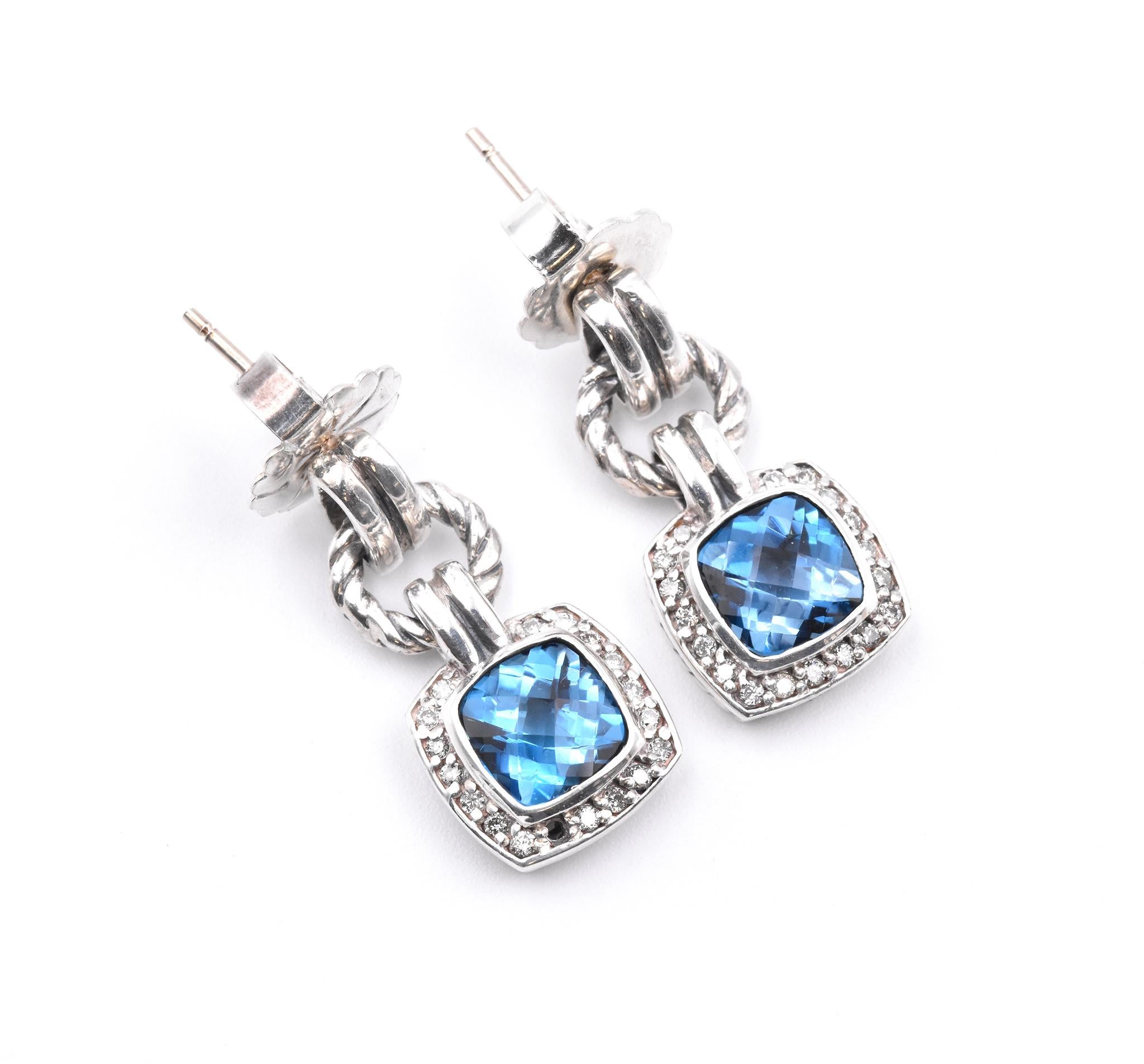 Designer: David Yurman
Material: Sterling Silver
Diamonds: 36 round cut = .25cttw
Color: G
Clarity: VS
Blue Topaz: 2 cushion cut = 9.50cttw
Weight: 7.65 grams