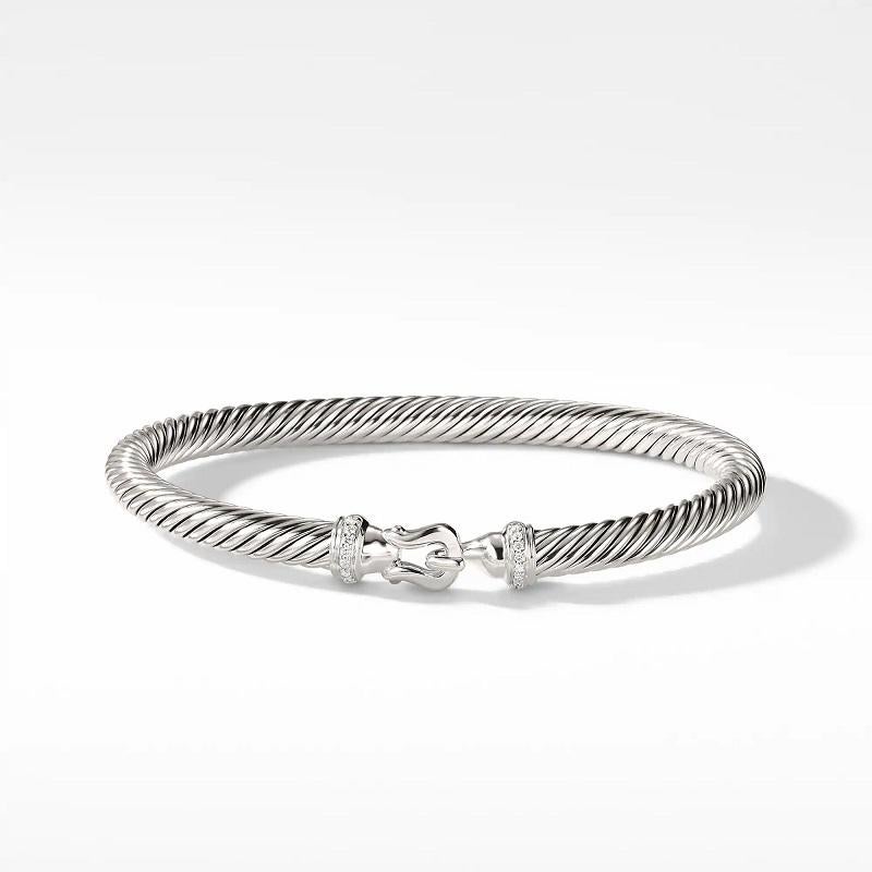 Sterling Silver
Pavé Diamonds, 0.06 total carat weight 
Cable, 5mm  
Hook clasp 
Size Medium 
B09308DSSADI