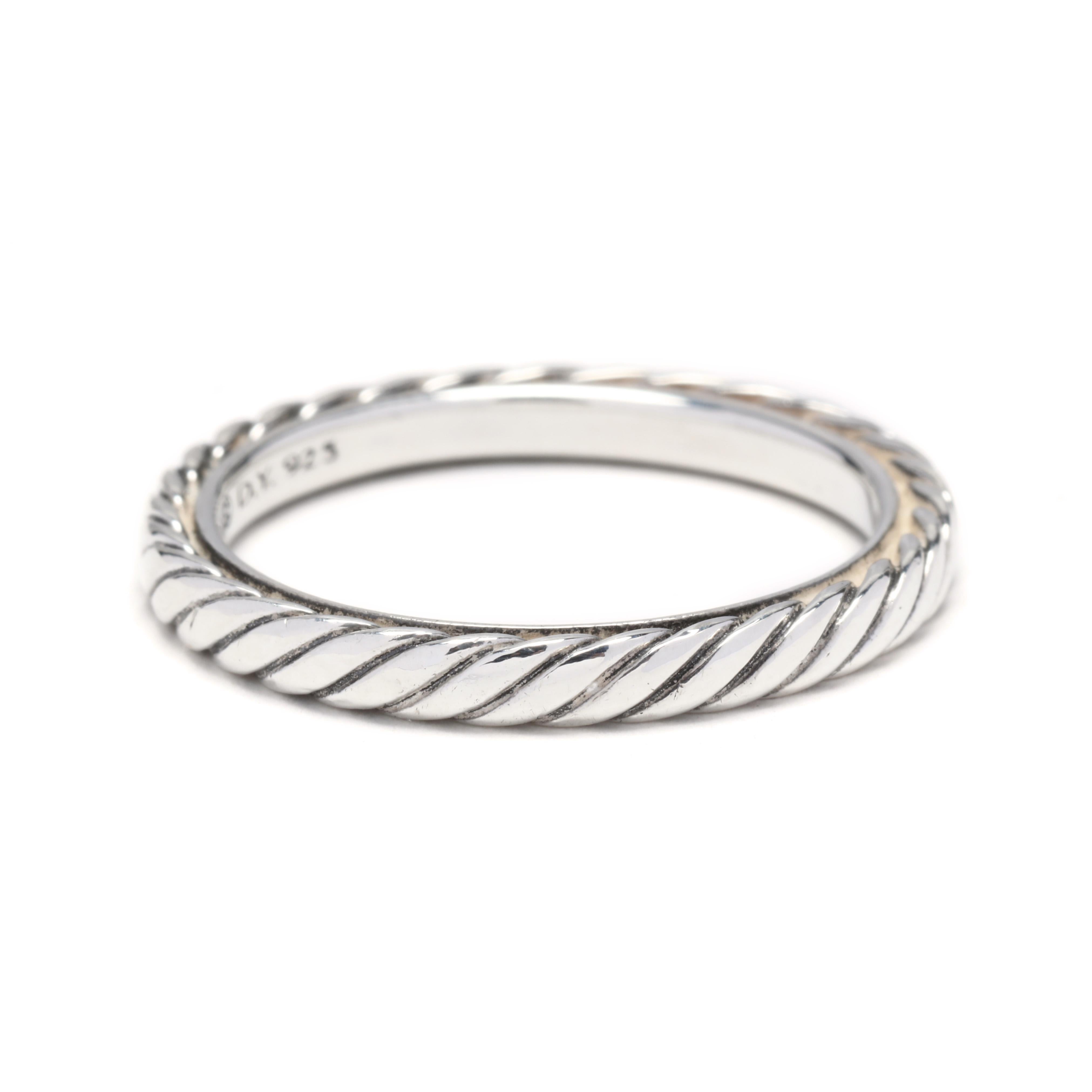 A David Yurman sterling silver cable band. This ring features a twisted cable motif design with a smooth inside band.



Ring Size 8



Width: 2.6 mm



Weight: 2.9 dwts.