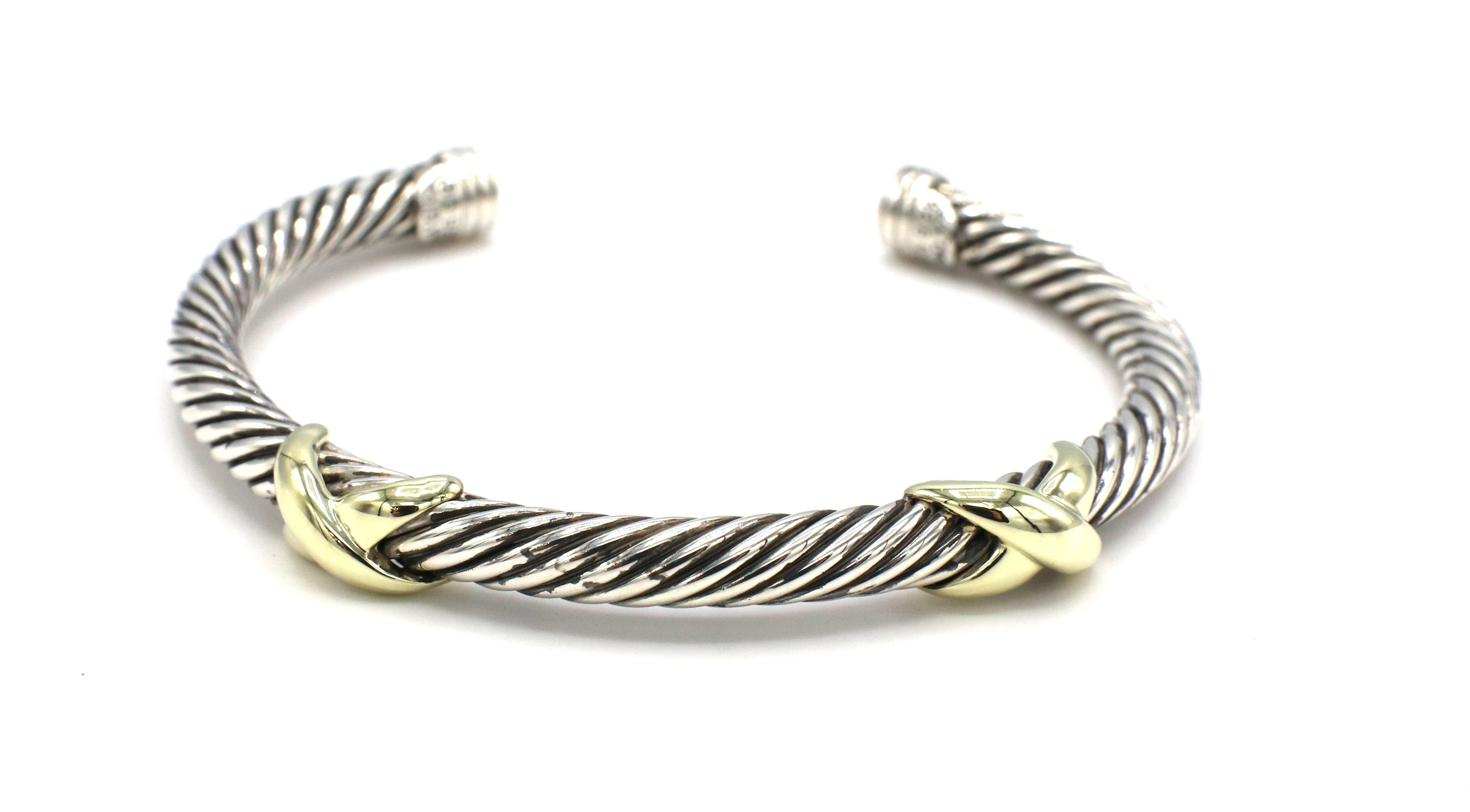 David Yurman Sterling Silver Cable Double X Bangle Bracelet 
Metal: Sterling silver & 14k yellow gold
Weight: 28.2 grams
Width: 4.8mm
Signed: D.Y. 585 925
Inside diameter: 55mm
Outside diameter: 65mm
Fits a wrist size approx. 6.75
