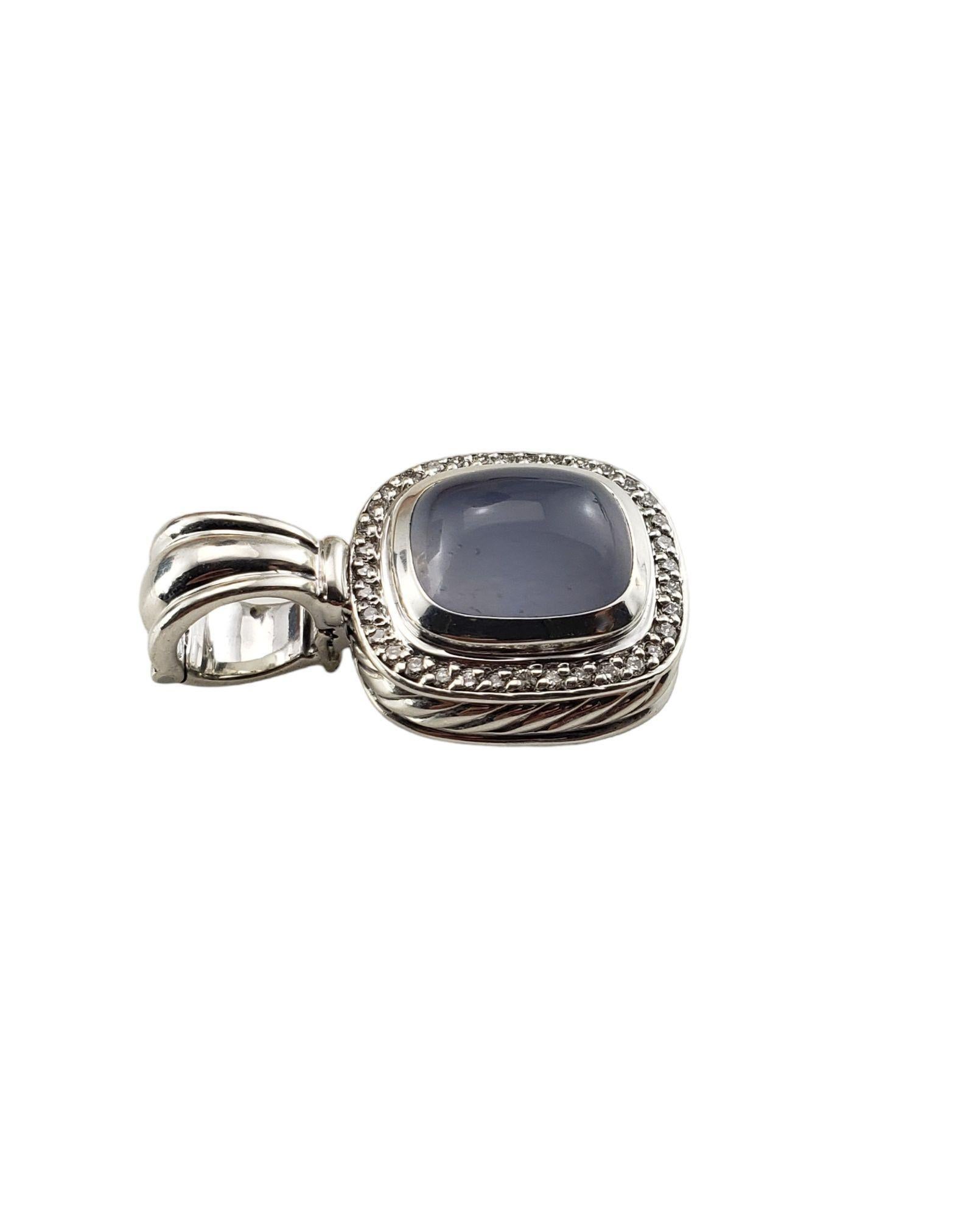 David Yurman Sterling Silver Chalcedony and Diamond Enhancer/Pendant-

This elegant David Yurman piece features one chalcedony stone (12 mm x 9 mm) and 36 round brilliant cut diamonds set in beautifully detailed sterling silver.

Approximate total