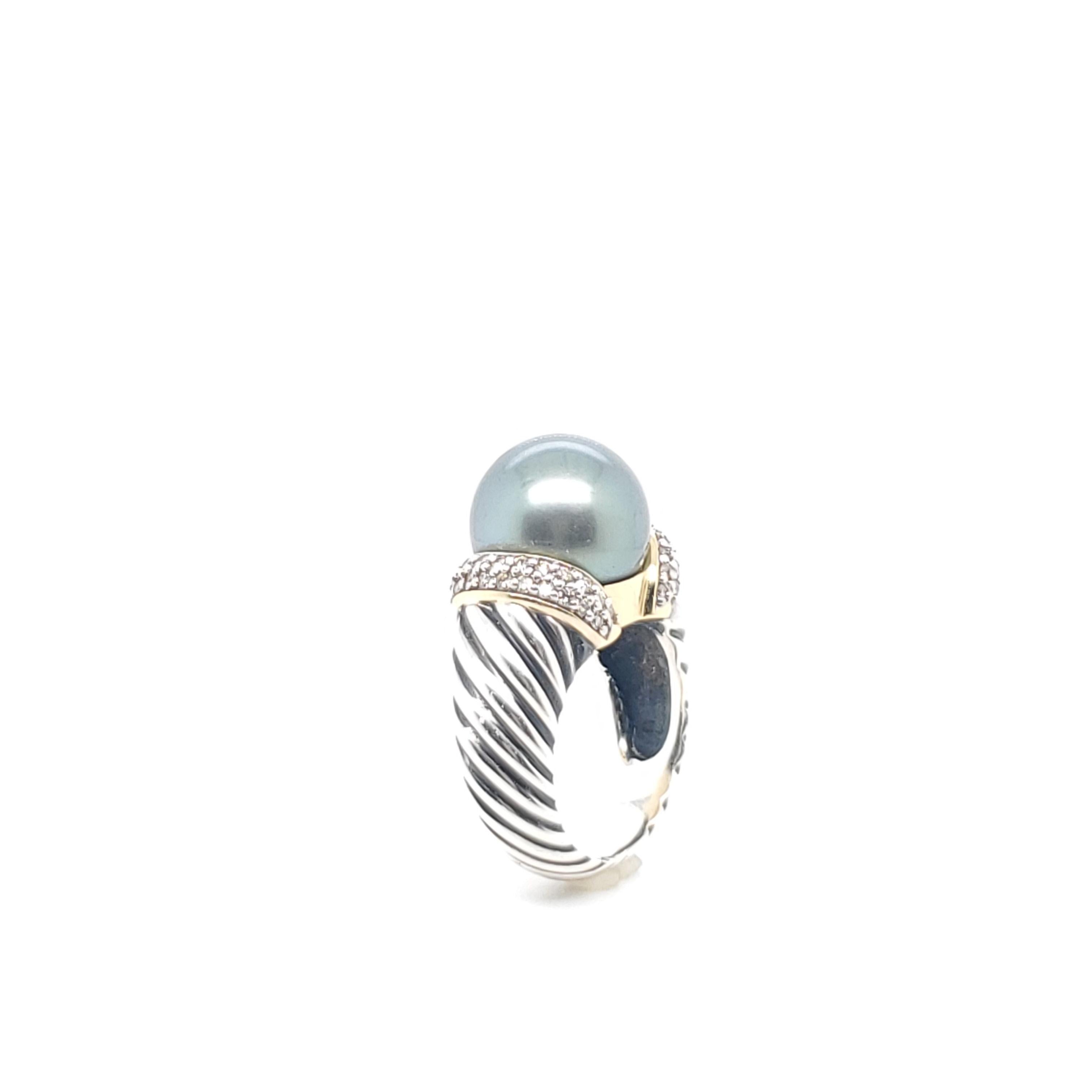 Authentic David Yurman sterling silver and 18 karat yellow gold diamond and mabe pearl cable ring. The ring features a gray mabe pearl that measures 12.8mm x 12.8mm framed by round brilliant cut diamonds weighing an estimated 0.52 carats total. The