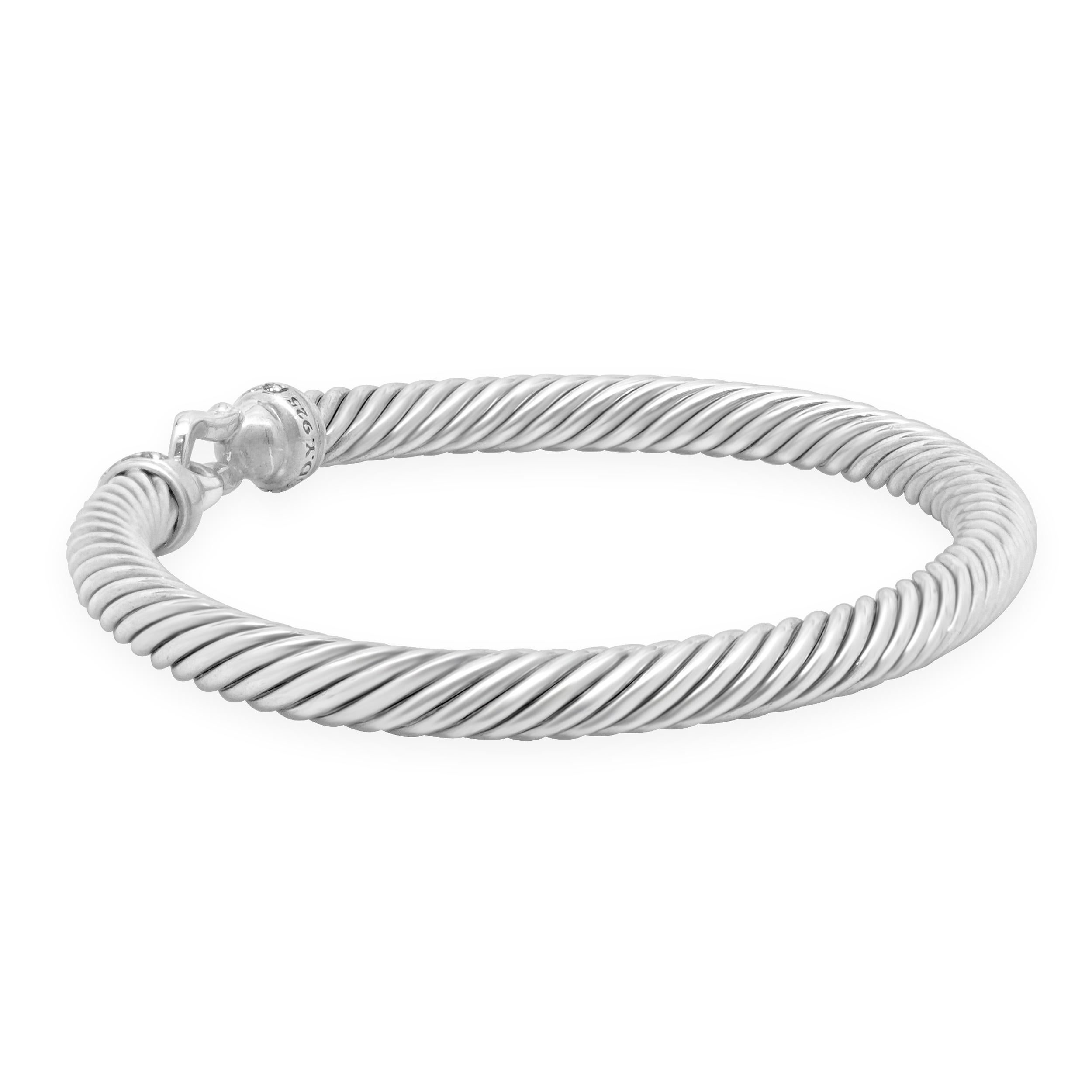 Designer: David Yurman
Material: sterling silver 
Diamond: 16 round cut = 0.12cttw
Color: H
Clarity: SI1
Weight: 28.30 grams
