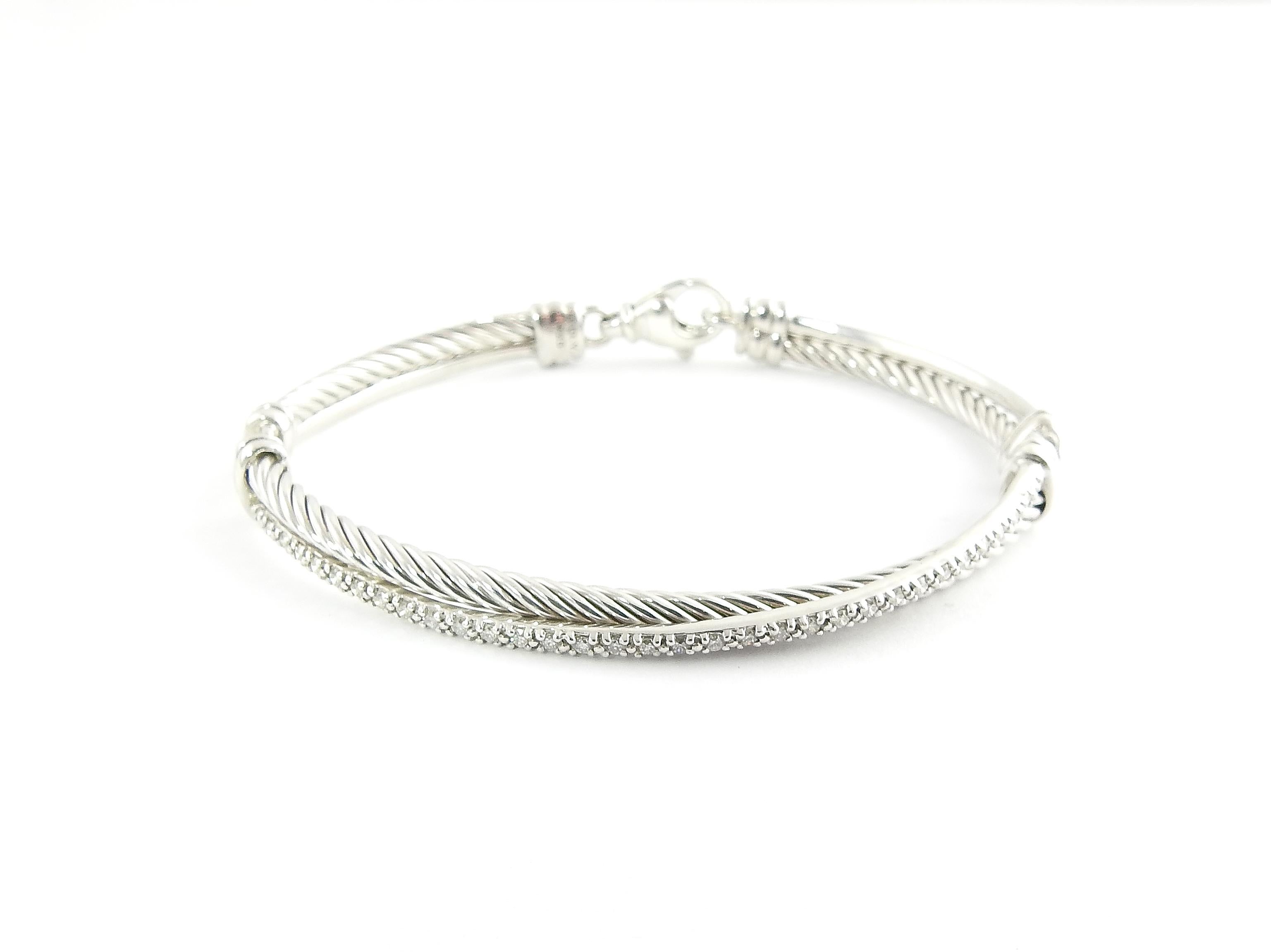 David Yurman Sterling Silver and Diamond Crossover Cable Bracelet

This authentic David Yurman bracelet is approx. 6.5