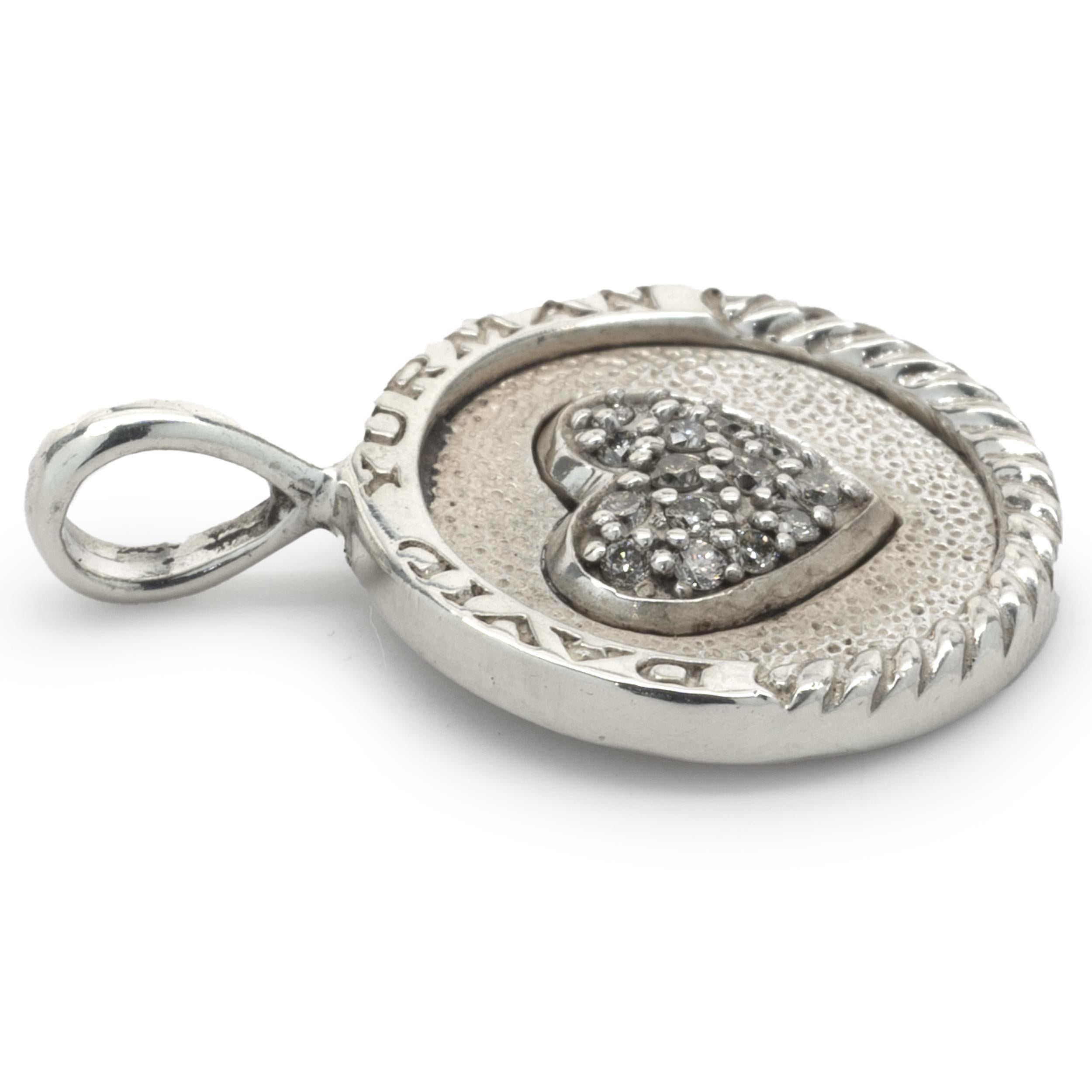 Designer: David Yurman
Material: sterling silver
Diamond: 15 round cut = .15cttw
Color: G
Clarity: SI
Dimensions: pendant measures 22.75mm
Weight: 3.03 grams
