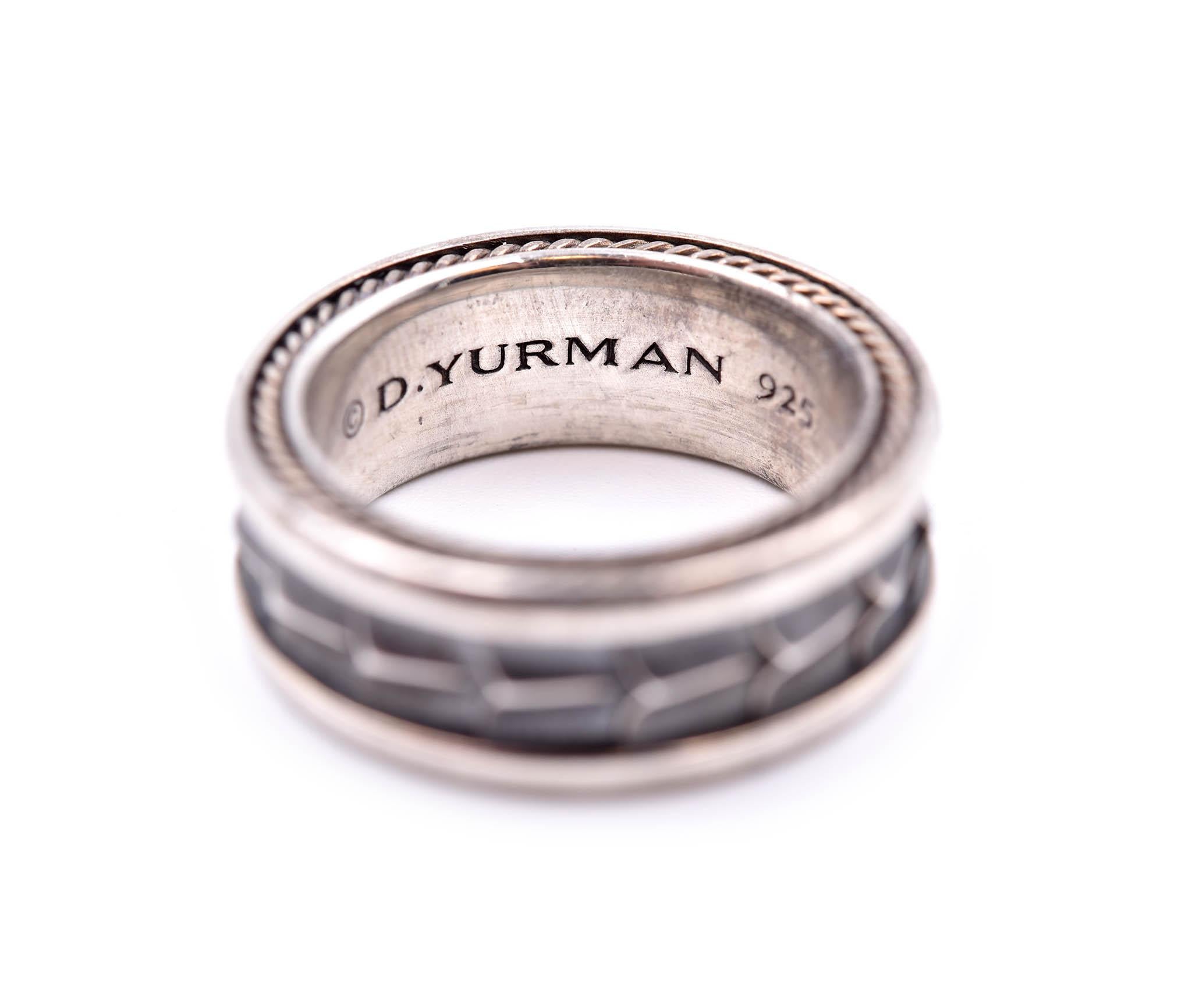 Designer: David Yurman
Material: Sterling Silver
Diameter: 8.80 mm X 25.80 mm 
Size: 9 1/2
Weight: 15.90
