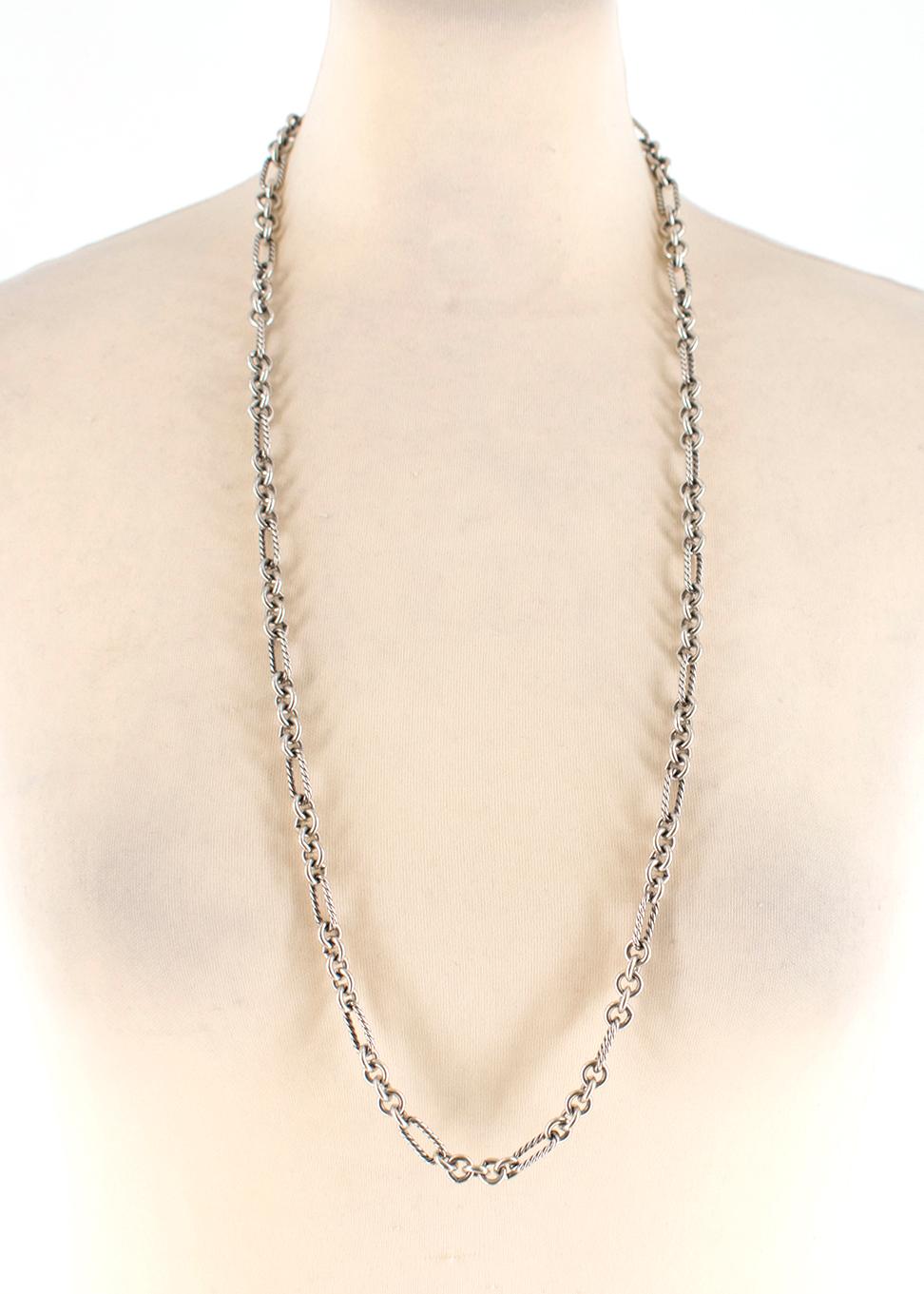David Yurman designed Figaro necklace with his classic sterling silver rings, cable links, and signature toggle clasp.

Please note, these items are pre-owned and may show signs of
being stored even when unworn and unused. This is reflected within