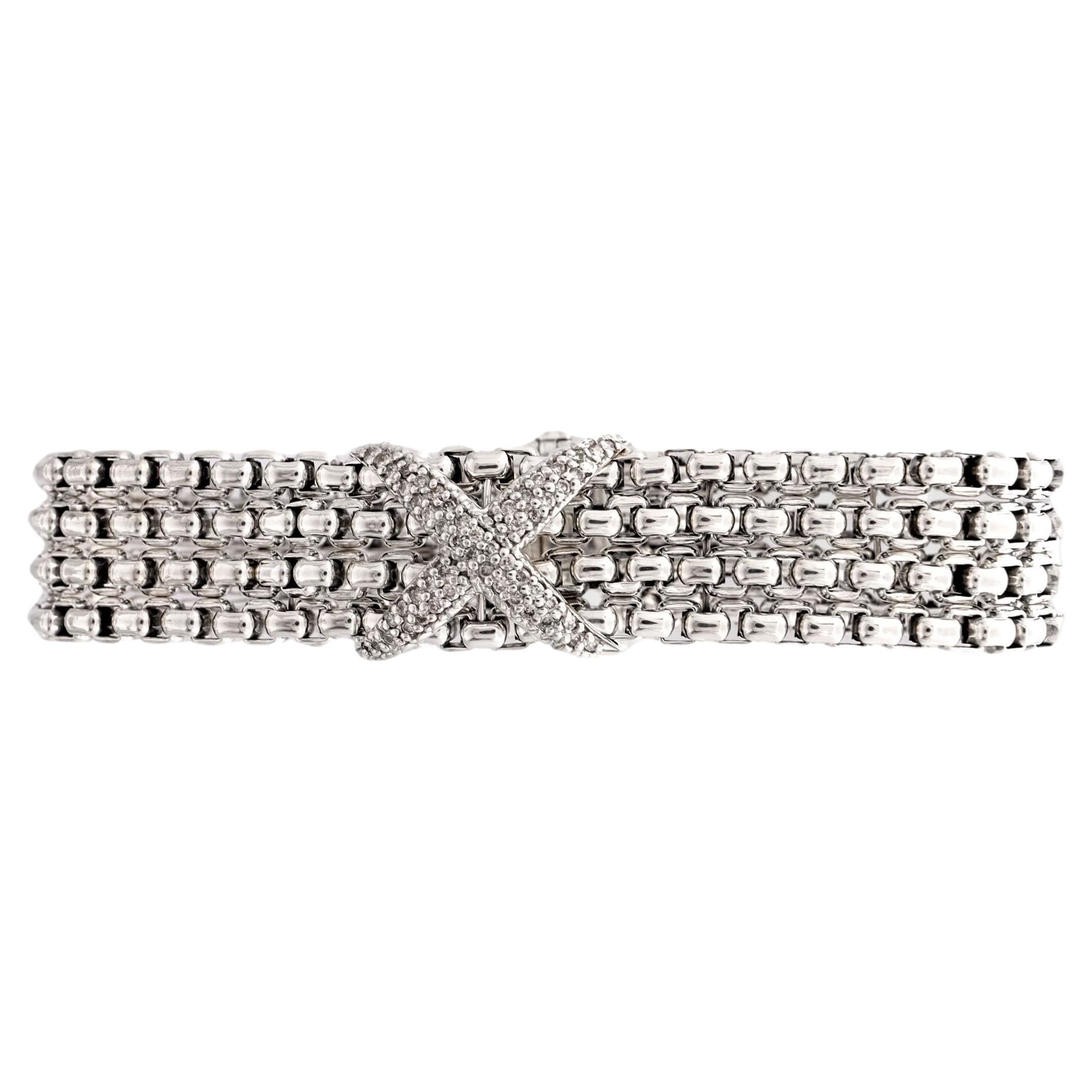 David Yurman 4-Strand Box Chain Diamond Bracelet Expertly fashioned in sterling silver, this captivating bracelet boasts four strands of intricate flexible box chains interwoven flawlessly. A delicate pave diamond X centerpiece sparkles subtly,