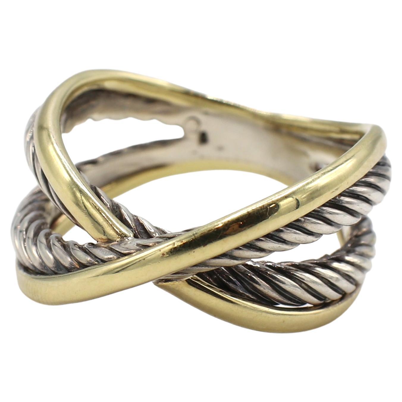 David Yurman Sterling Silver & Gold Cable Crossover Band Ring 
Metal: Sterling silver & 18k yellow gold
Weight: 8.68 grams
Size: 8 (US)
Width: 3 - 11.8mm
Signed: D.Y. 750 925
