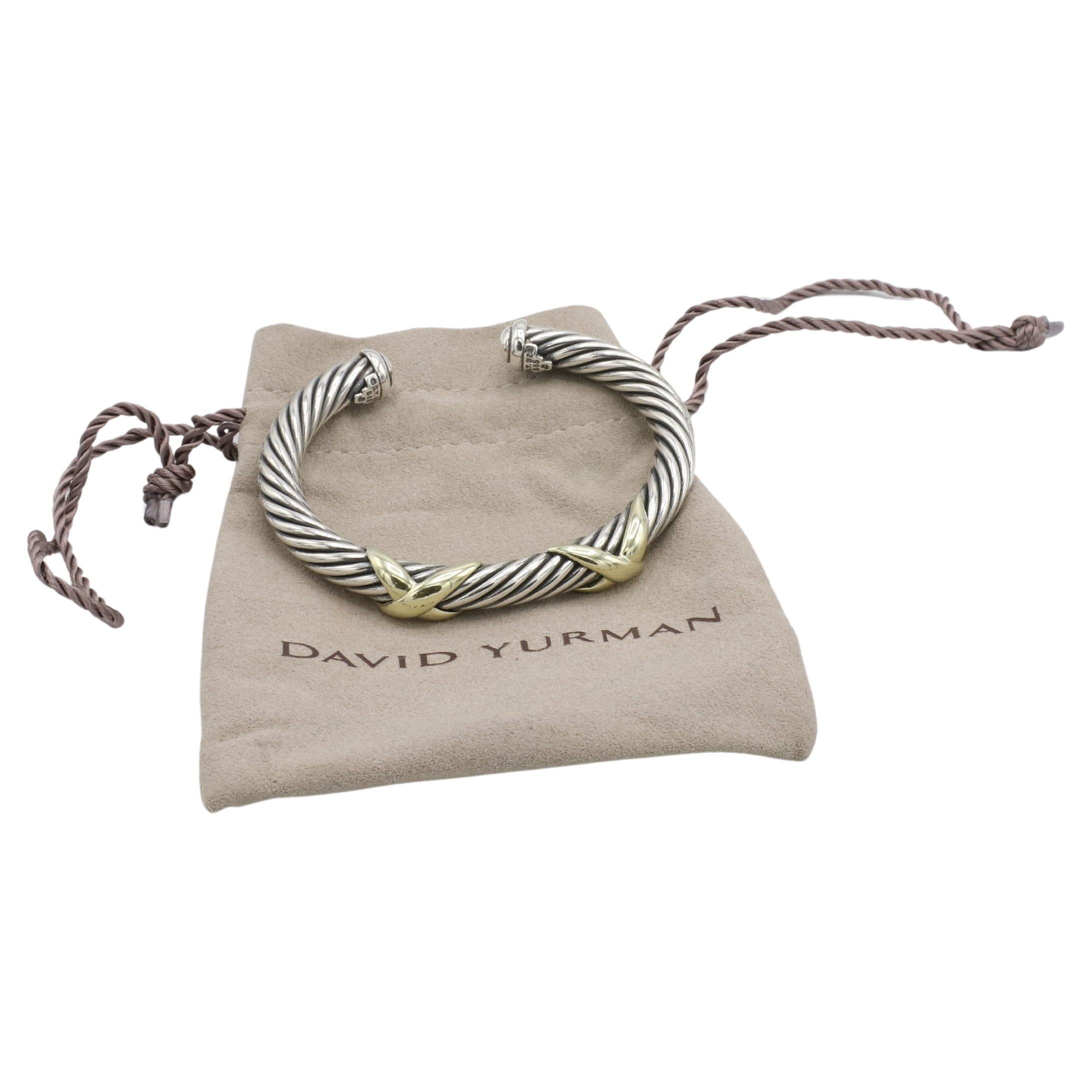 David Yurman Sterling Silver & Gold Cable Double X Bangle Cuff Bracelet 7MM
Metal: Sterling silver & 14k yellow gold
Weight: 45.6 grams
Width: 7MM
Size: Fits up to a 6.5 inch wrist
Signed: ©D.Y. 925 585

