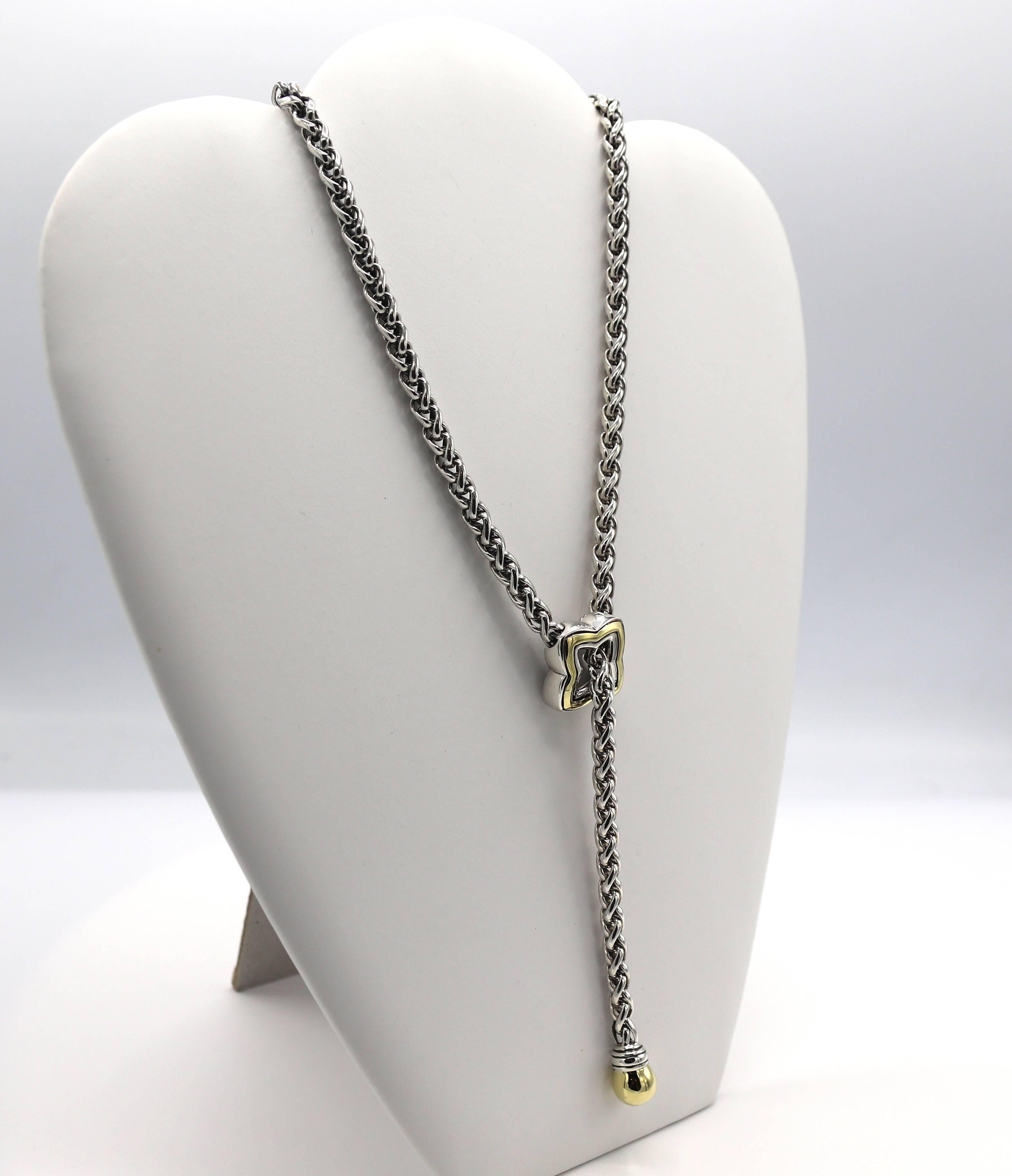 David Yurman Sterling Silver & Gold Quaterfoil Lariat Drop Necklace 
Metal: Sterling silver & 14k yellow gold
Weight: 69.2 grams
Chain width: 5mm
Length: 20