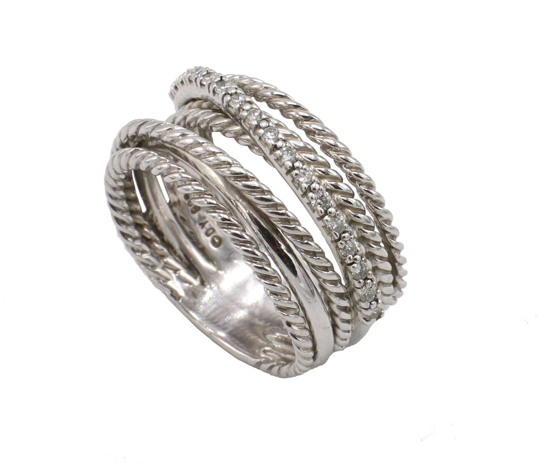 David Yurman Sterling Silver Natural Diamond Multi-Row Crossover Band Ring 
Metal: Sterling silver
Weight: 6.82 grams
Width: 11mm
Retail: $750 USD
Diamonds: 0.23 CTW G VS natural round diamonds 
Size: 7 (US)
Signed: ©D.Y. 925