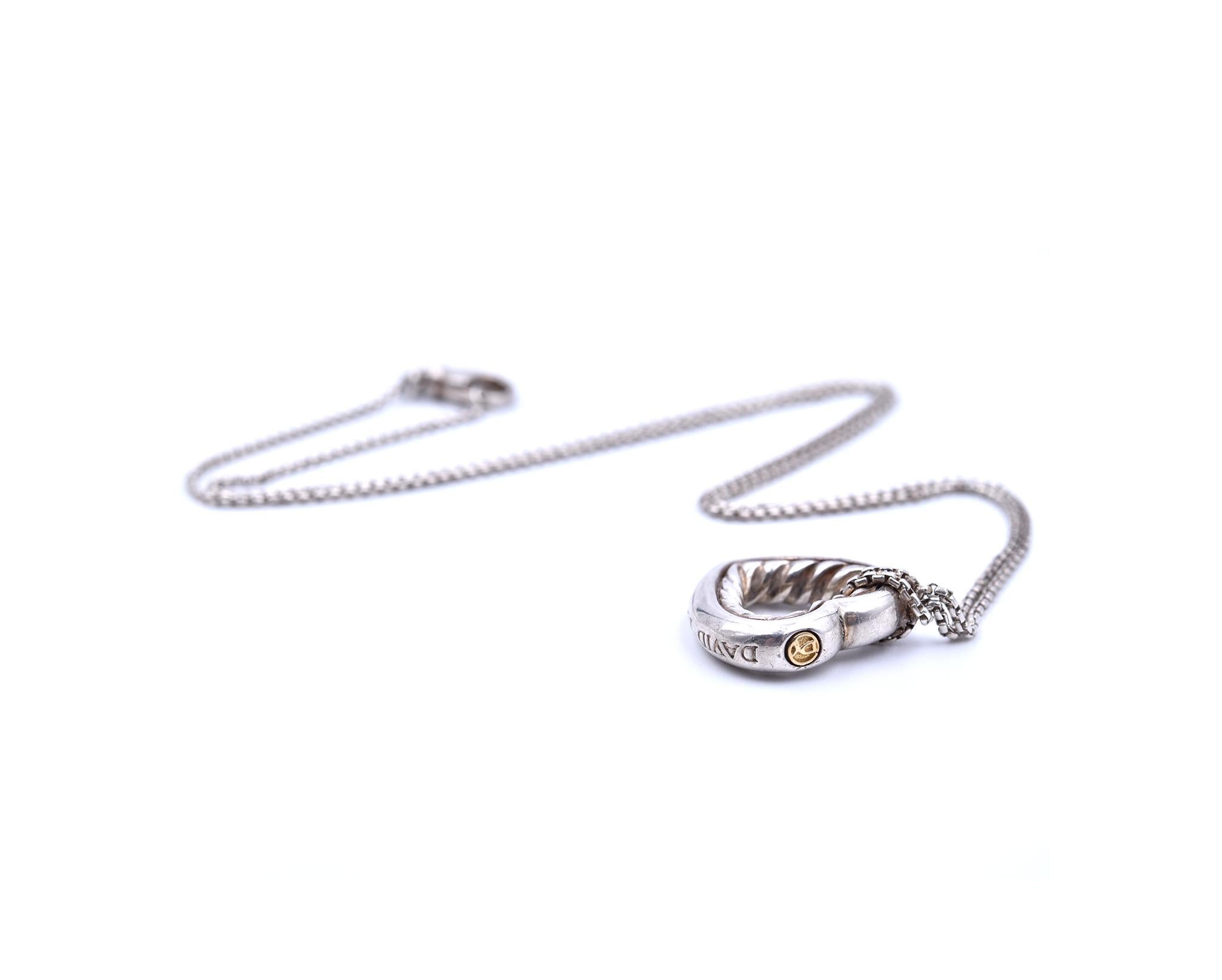 Designer: David Yurman
Collection: Cable Collection
Material: sterling silver
Dimensions: pendant measures 3/4-inch long and 3/4-inch wide, necklace measures 
Weight: 23.10 grams
