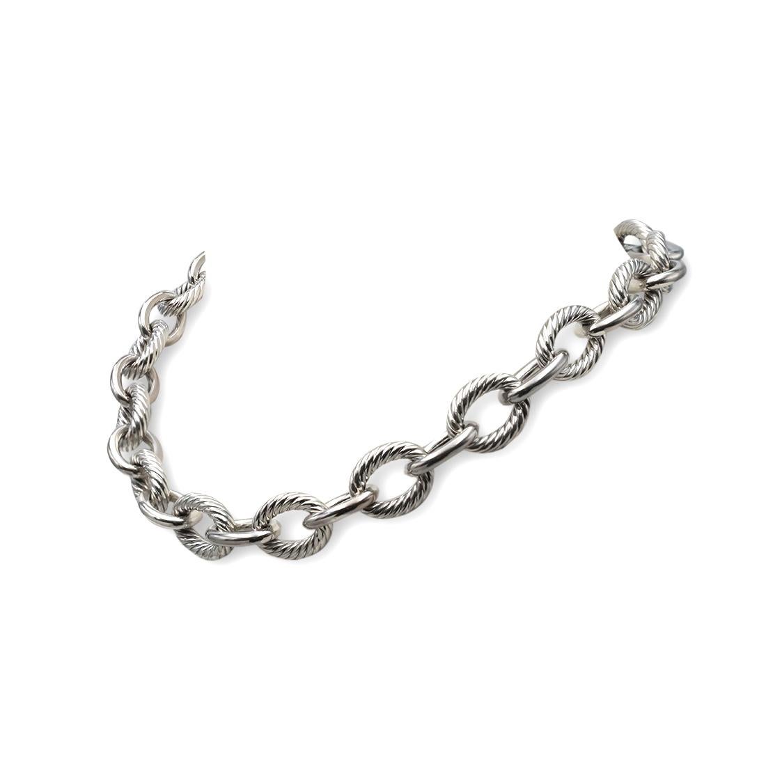 Authentic David Yurman necklace comprised of interlocking sterling silver oval-shaped links. The cabled links measure 4.5mm and the smooth links are 3.5mm. Signed D.Y., 925. The necklace is not presented with the original box or papers. CIRCA 2000s.