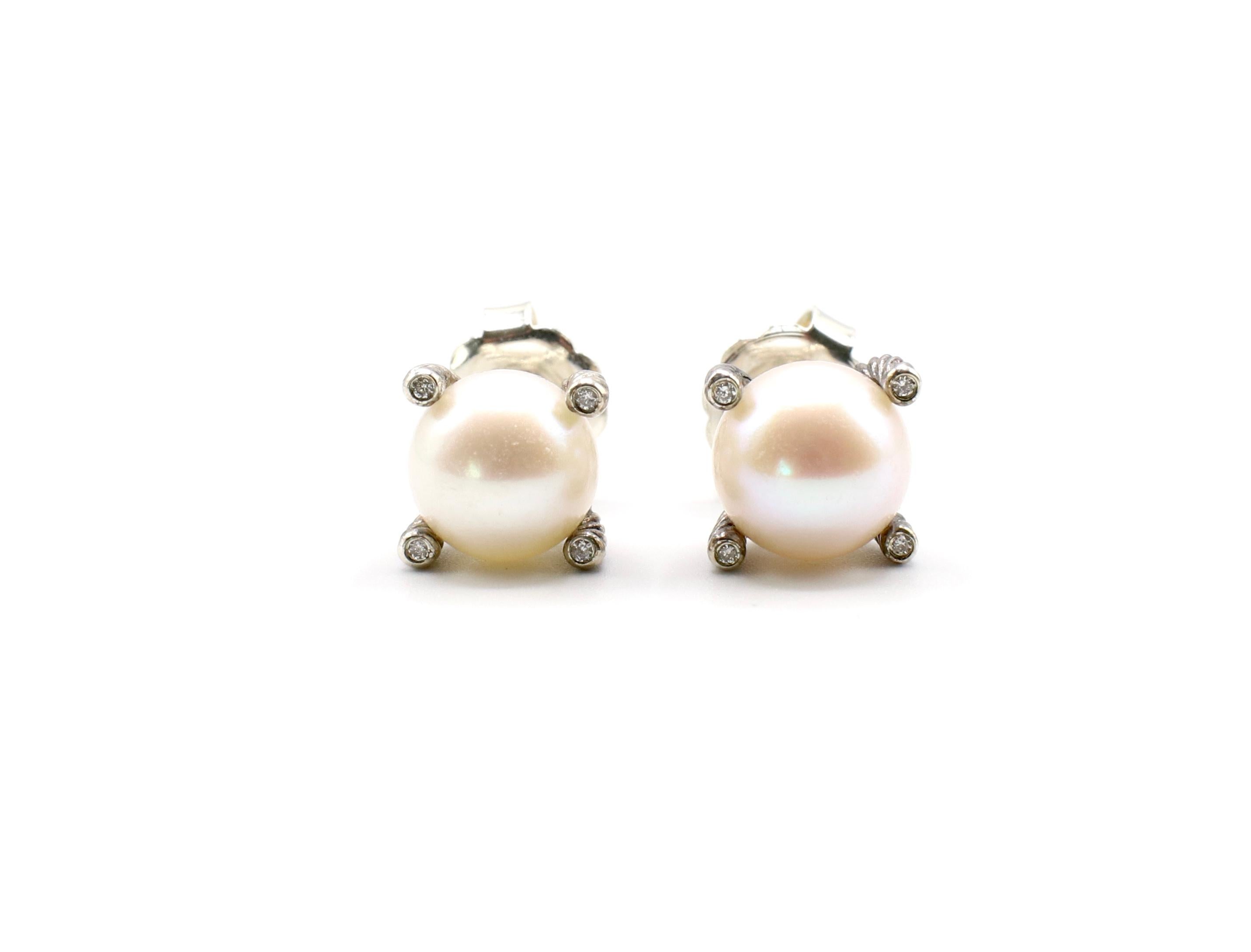 Vintage David Yurman Sterling Silver Pearl & Diamond Cable Ear Stud Earrings

Metal: Sterling silver
Weight: 4.96 grams
Pearls: 2 white cultured freshwater 9.5mm pearls
Diamonds: 8 round brilliant cut diamonds: .04 CTW G VS
Signed: D.Y. 925
Recently