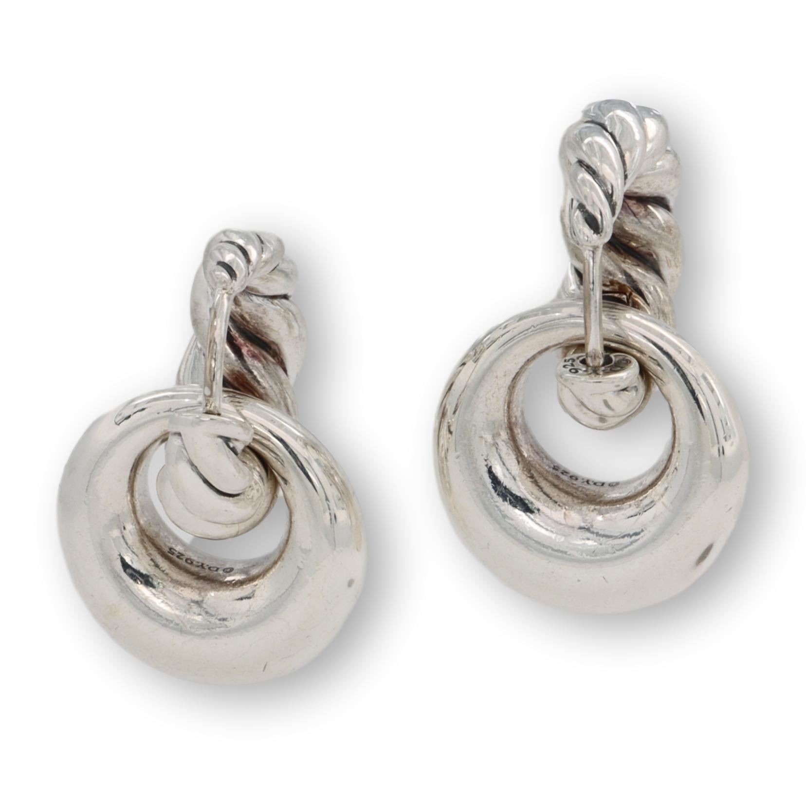David Yurman door knocker detachable earrings from the pure form collection finely crafted in sterling silver featuring a cable huggie on top and a smooth ring on the bottom with a snap closure. Earrings drop 24mm from the ear. Bottom part of
