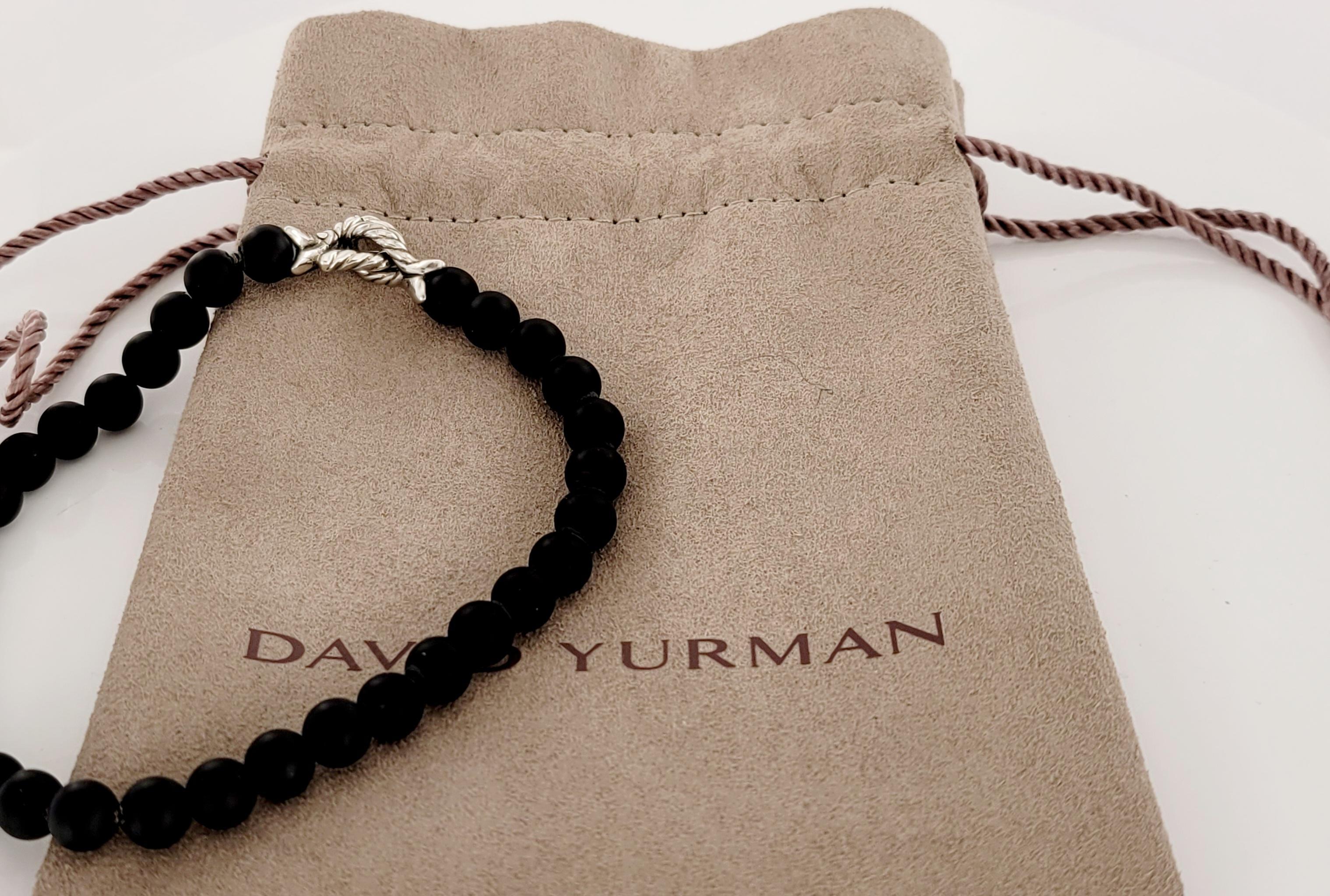 Brand David Yurman
Style Matte black beads bracelet  
Material Sterling Silver 925
Onyx  Width 6mm'
Hallmark (C)D.Y. David Yurman 925
David Yurman pouch included
Perfect gift for any occasion 
Condition Never Worn (New)