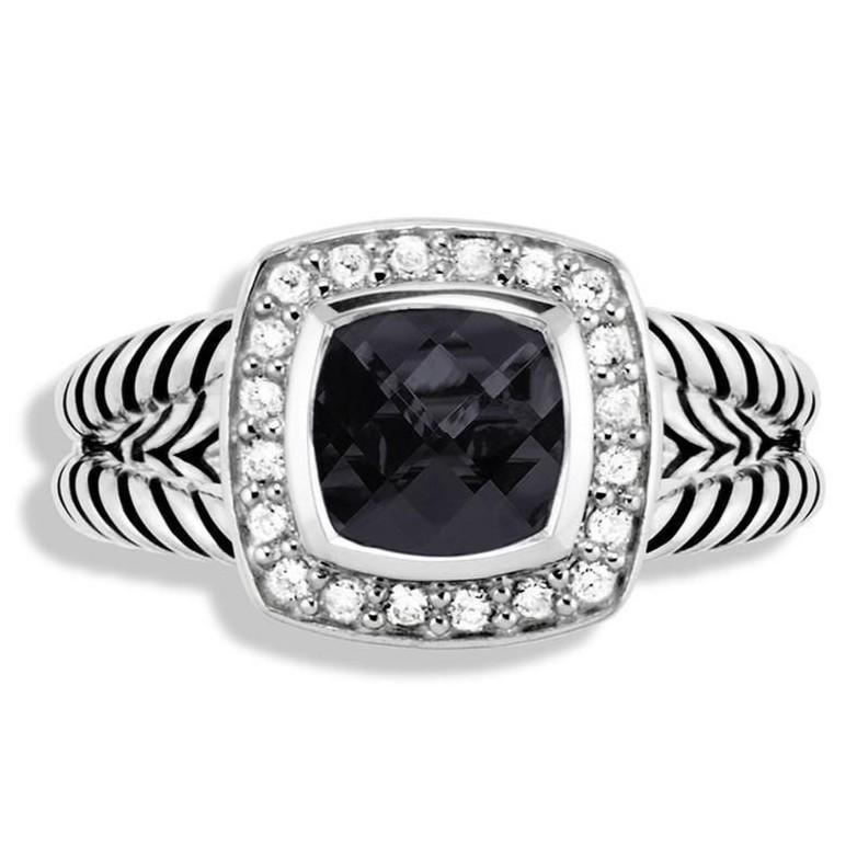 Elevate your jewelry collection with the exquisite David Yurman Sterling Silver & Onyx Ring. This stunning piece features a sophisticated split shank design, crafted from high-quality sterling silver, ensuring both durability and elegance. The