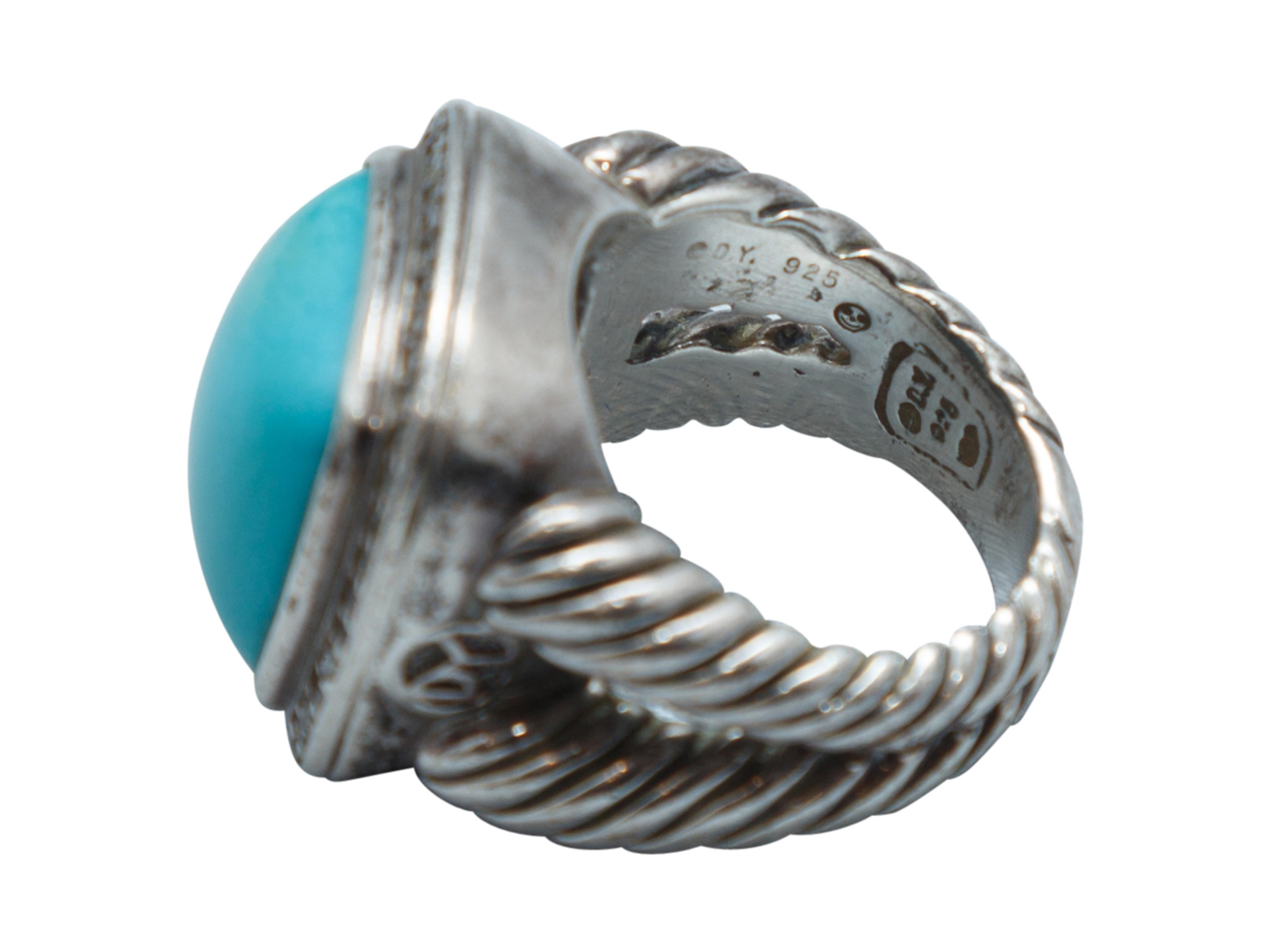 Product details: Sterling silver statement ring by David Yurman. Turquoise stone at center surrounded by diamonds. 1