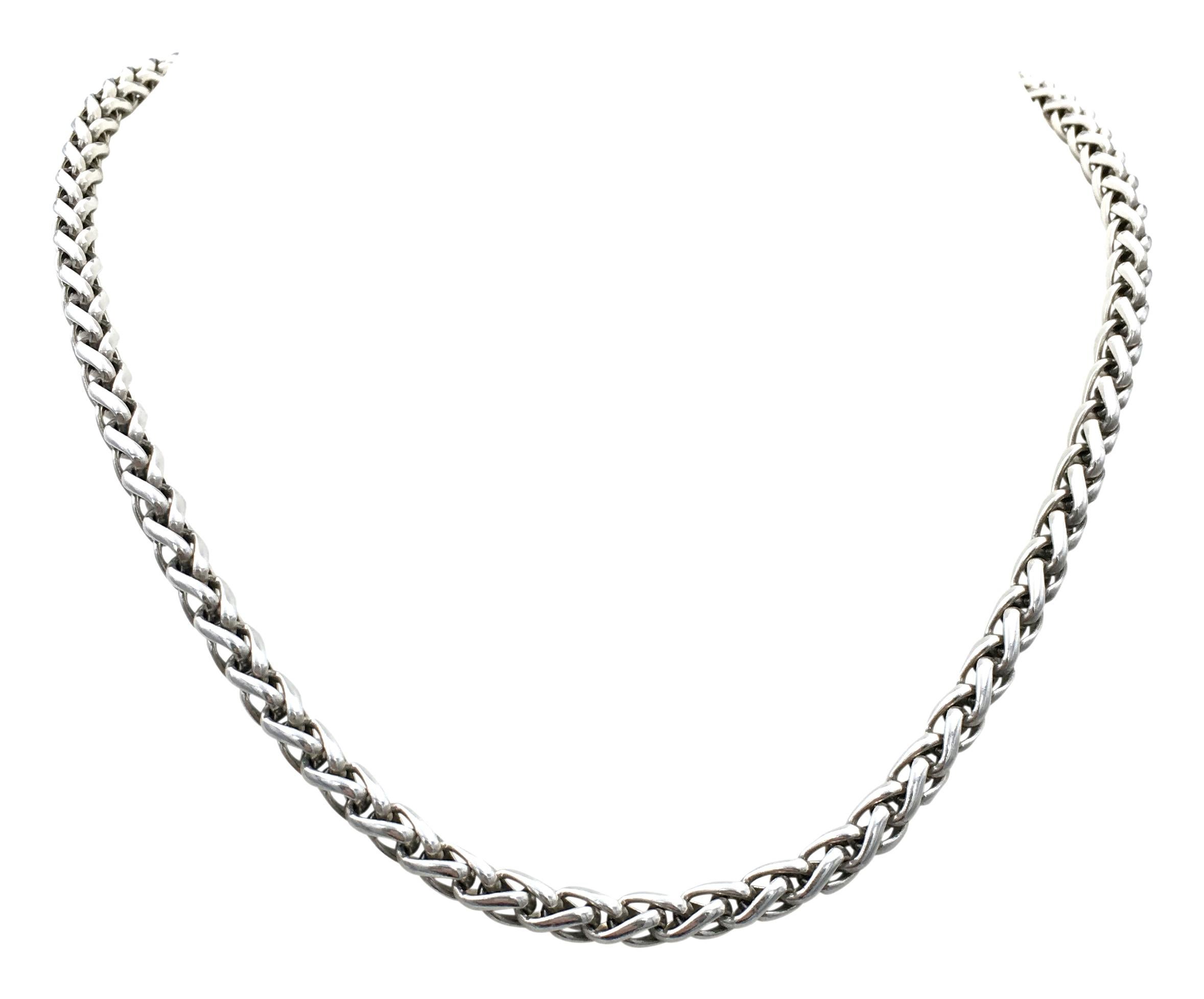 Authentic David Yurman sterling silver long wheat chain. The necklace is 17.5 inches in length. Signed D.Y. 925. Does not come with original box or papers. 