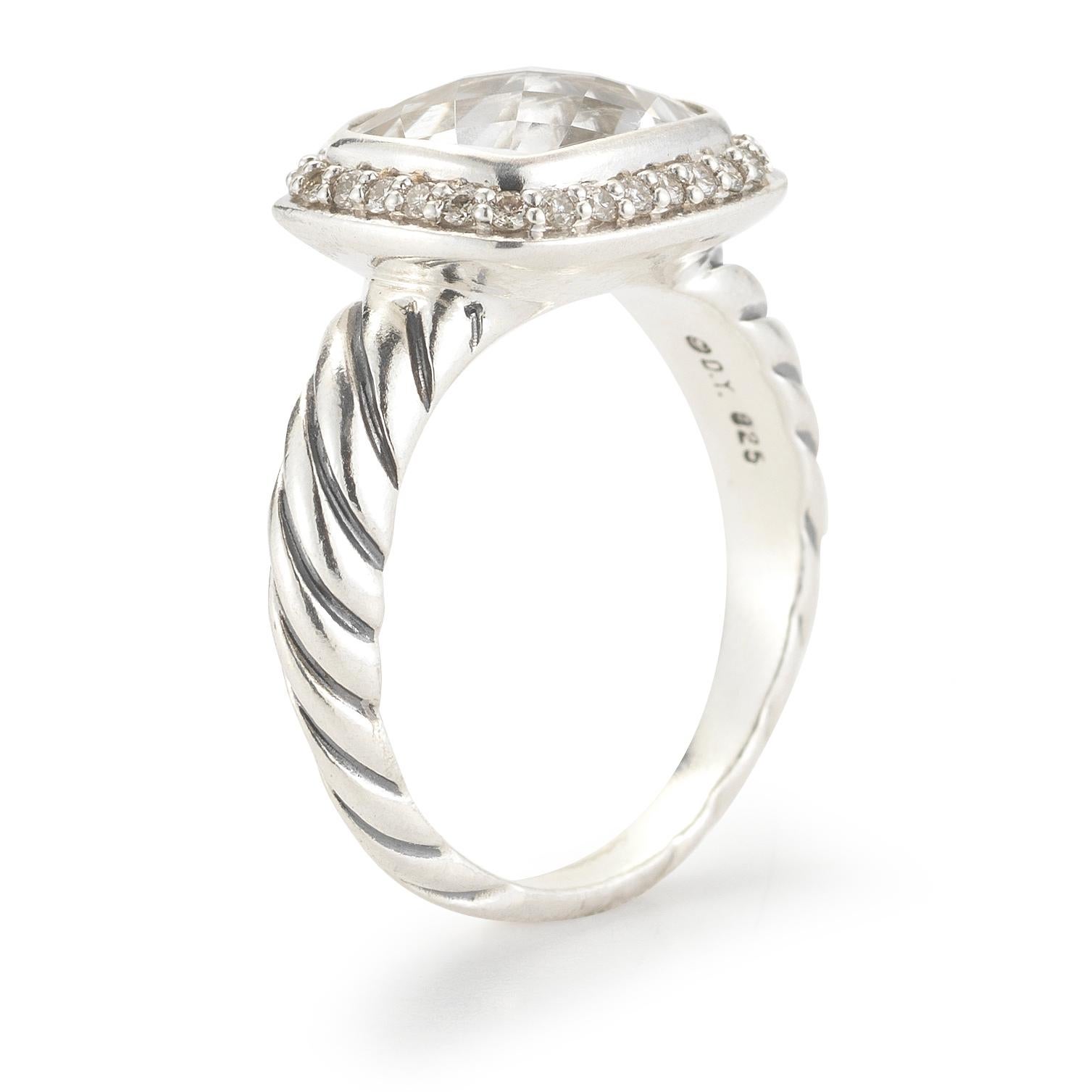  A faceted cushion white topaz measuring 10 x 8mm is accented with pavé diamonds totaling approximately 0.18ct, mounted in sterling silver, size 6. From the Noblesse Collection.